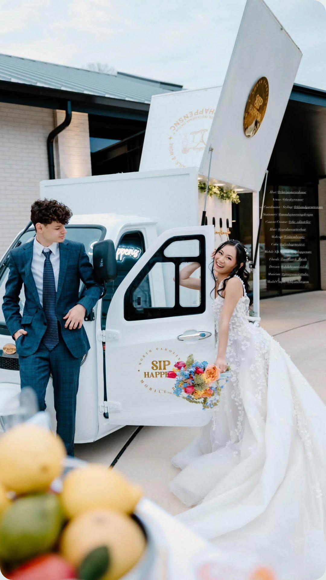 Bride and groom next to Sip Happens mobile bar truck
