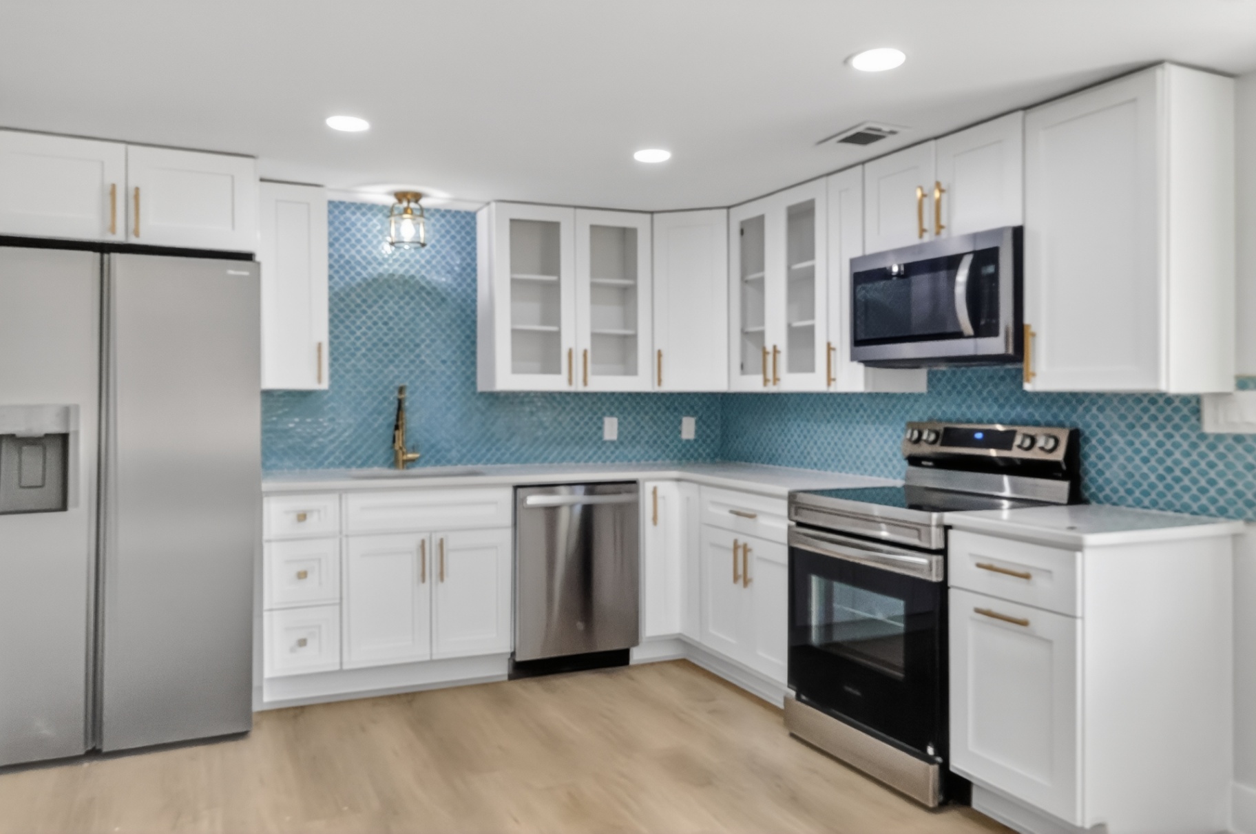 Modern Kitchen with Blue Tile Backsplash
