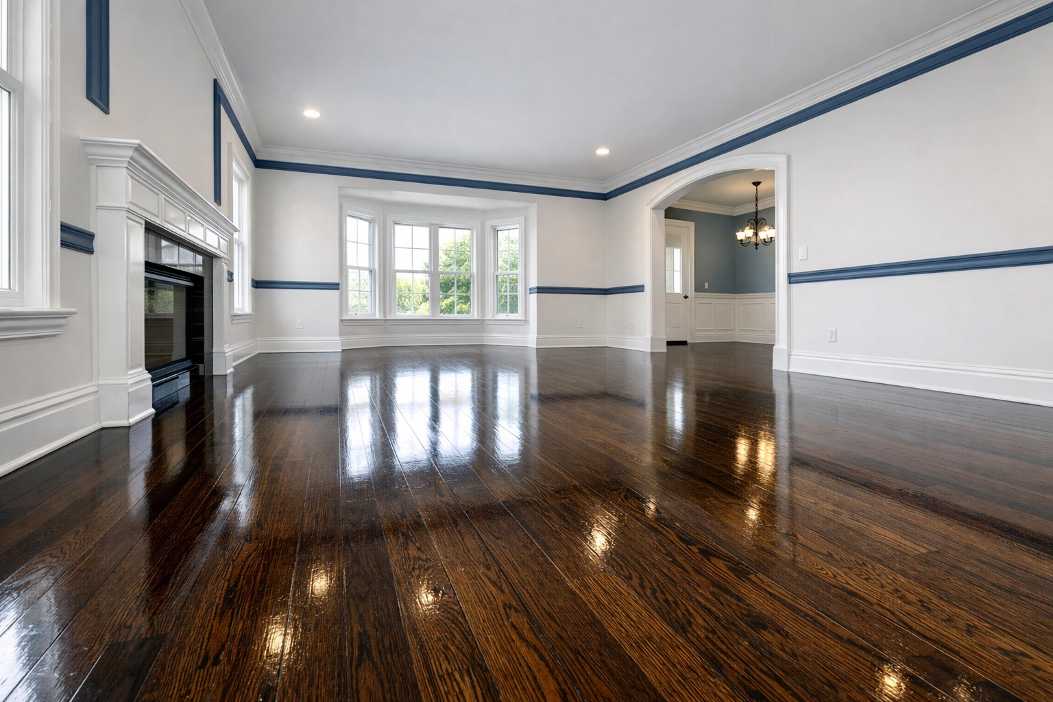 Empty residential living room with polished floors from expert maid services Worcester.