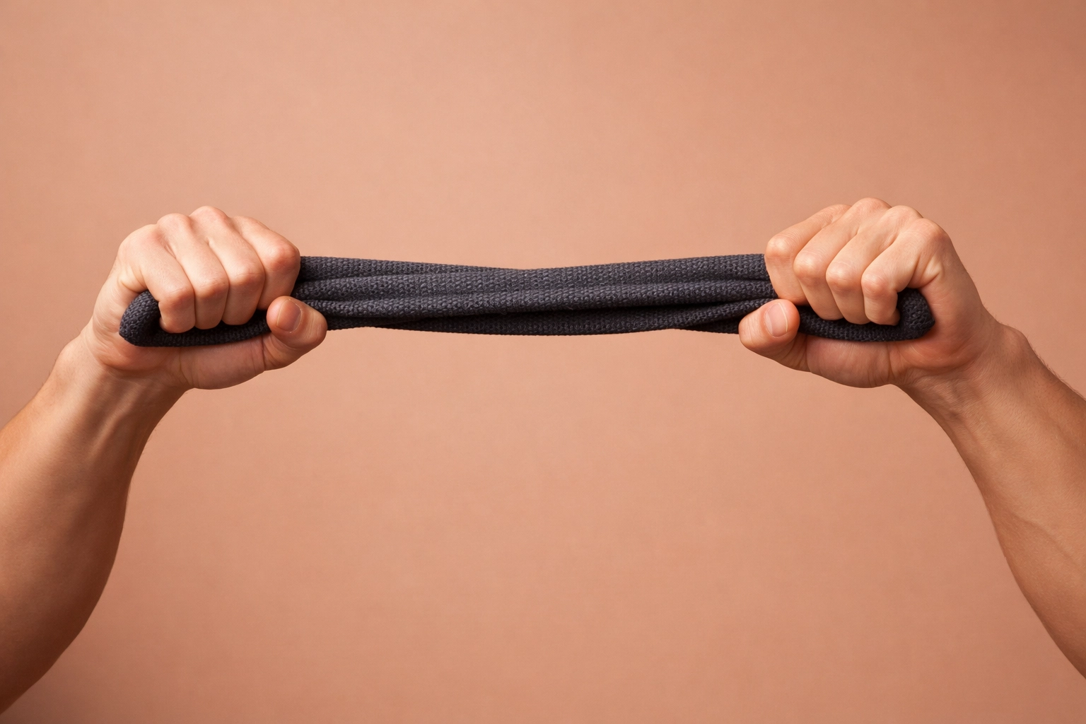 Close-up of a person using a resistance band to build muscle strength without high-impact joint stress.