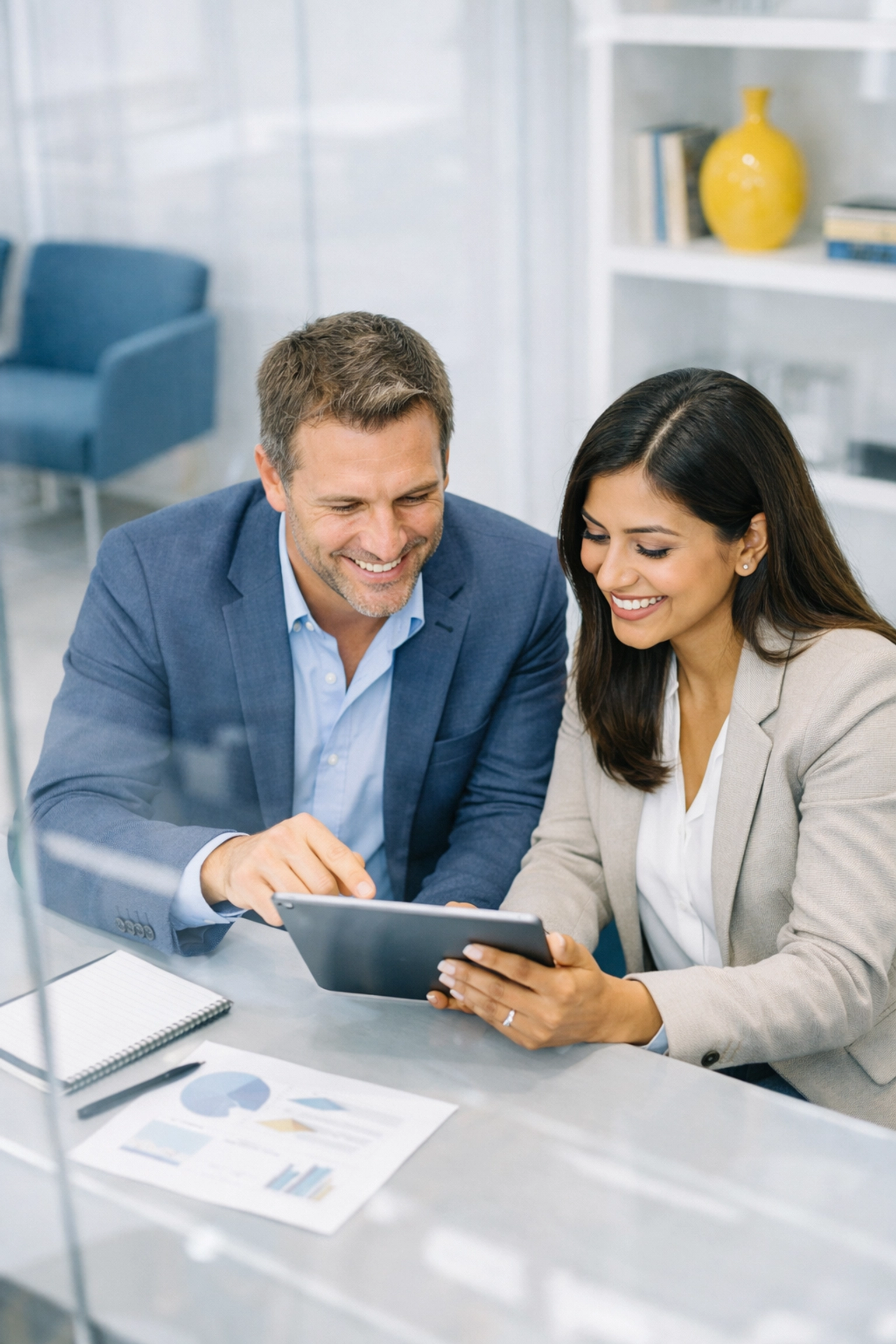 Fundraising team collaborating on transparent donor impact reports in a modern office setting.