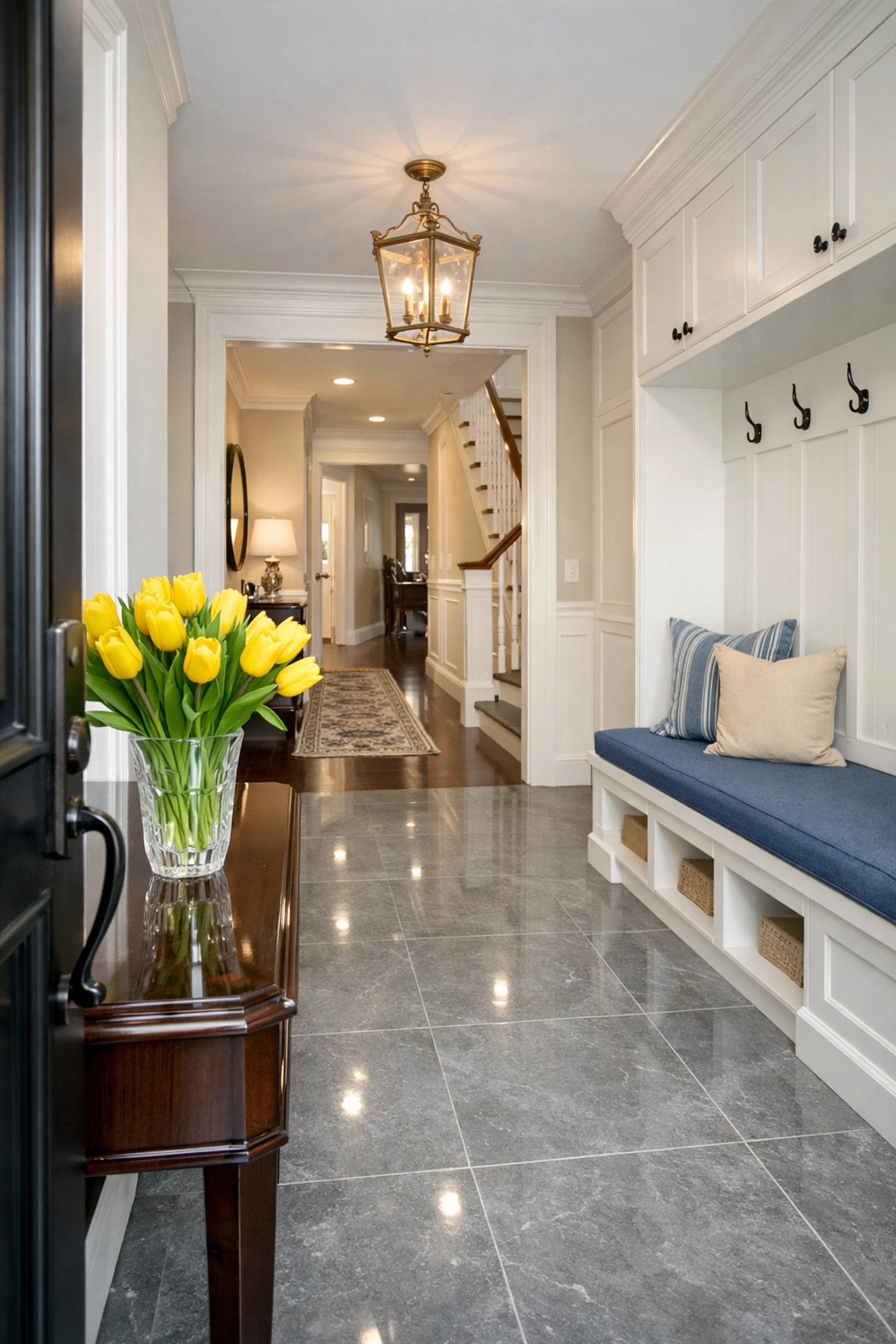 Professional cleaners MA transformed a luxury entryway with spotless stone floors and fresh spring decor.