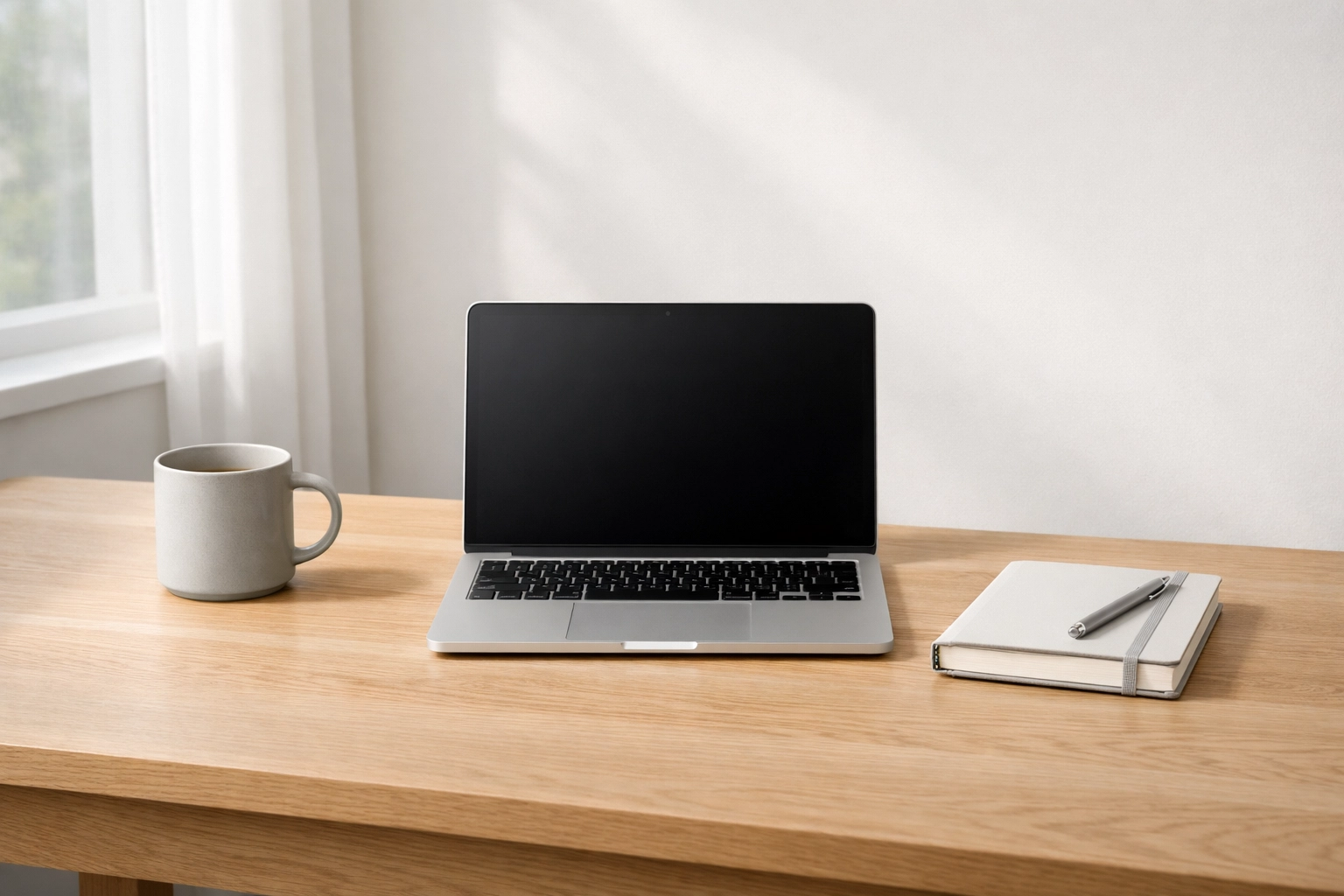 A minimalist modern office desk representing streamlined business processes and efficient startup scaling.