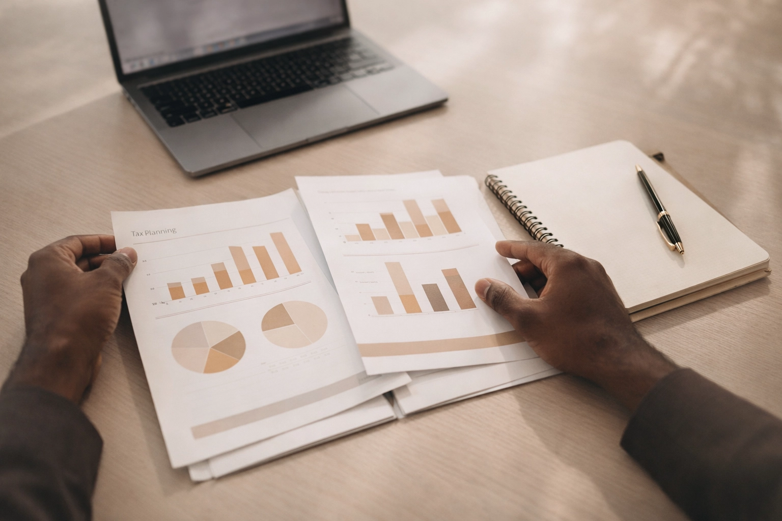 Tax planning documents and financial charts showing strategic opportunities for businesses