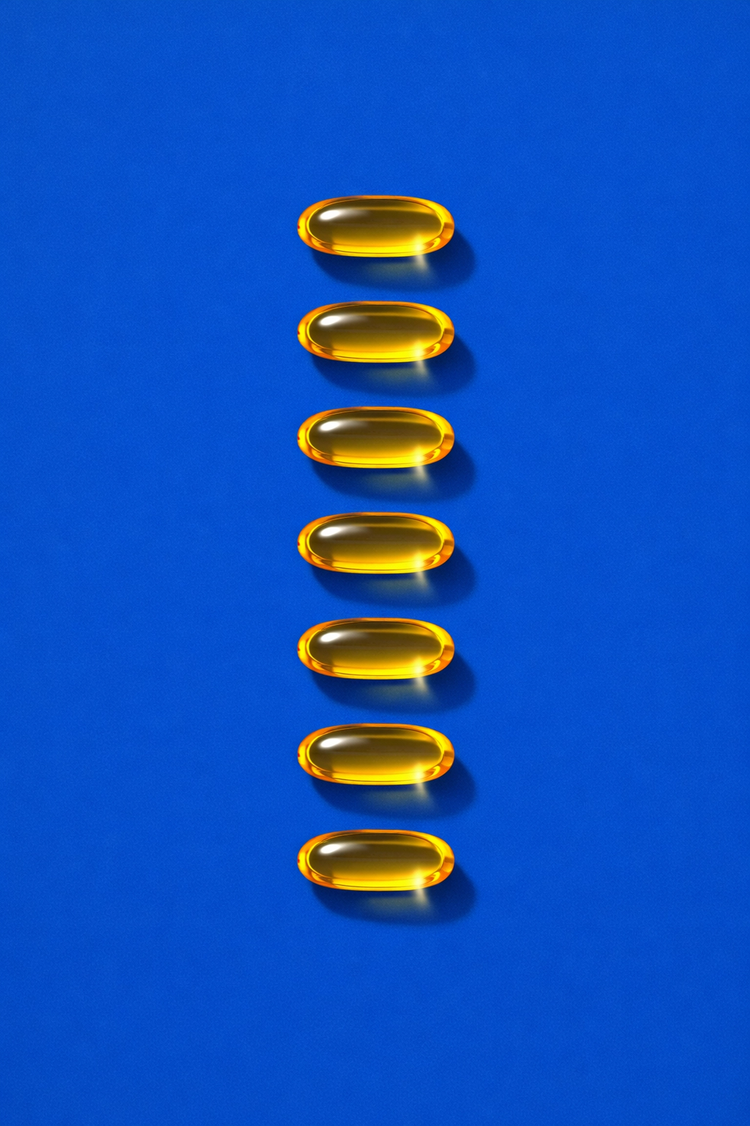 Golden Omega-3 capsules for joint health and anti-inflammatory support for competitive swimmers.