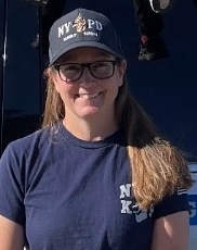 Instructor in NYPD K9 Cap and T-shirt Outdoors