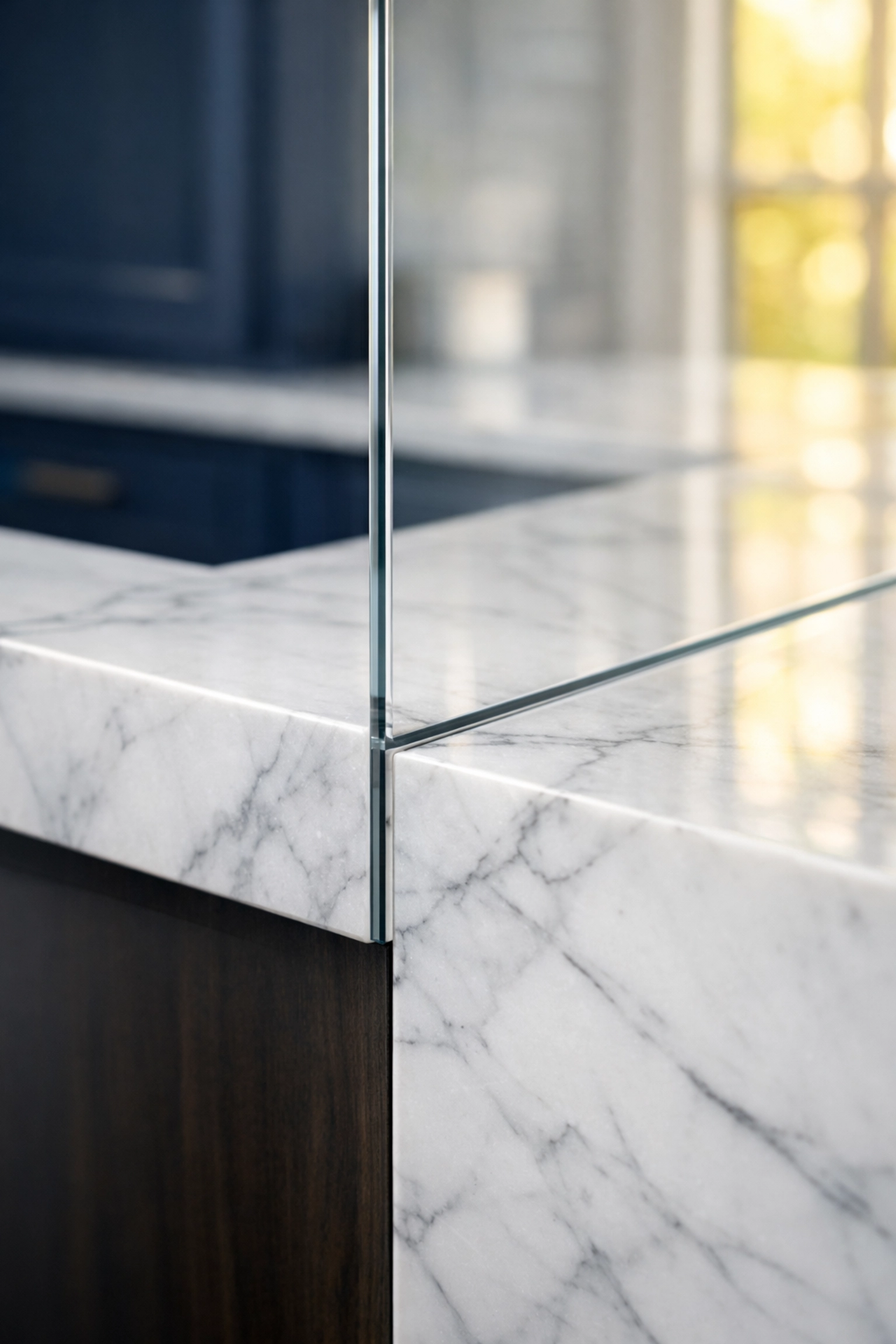 Eco-friendly luxury house cleaning of white marble countertops and glass in a high-end kitchen.