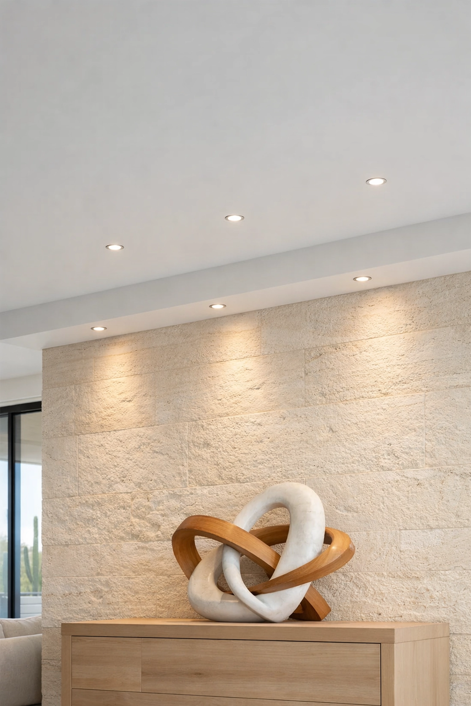 Modern recessed LED ceiling lights in a Scottsdale home highlighting architectural details.