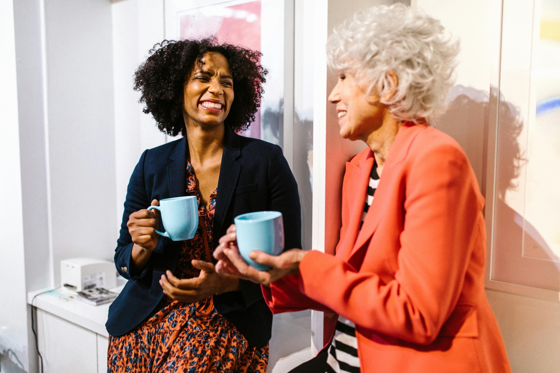 Two women enjoying conversation in a welcoming space