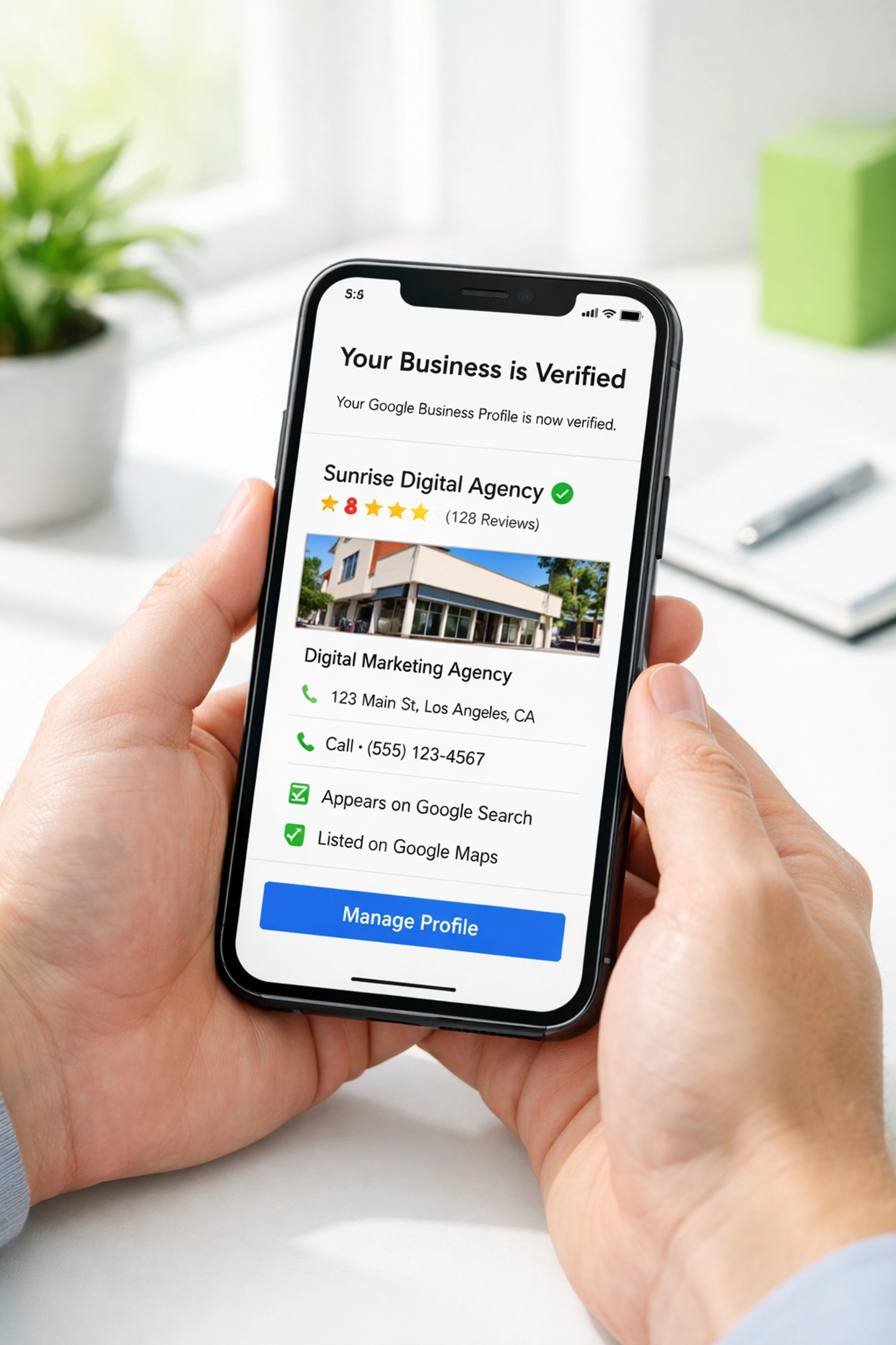Google Business Profile verification screen with checkmarks on smartphone