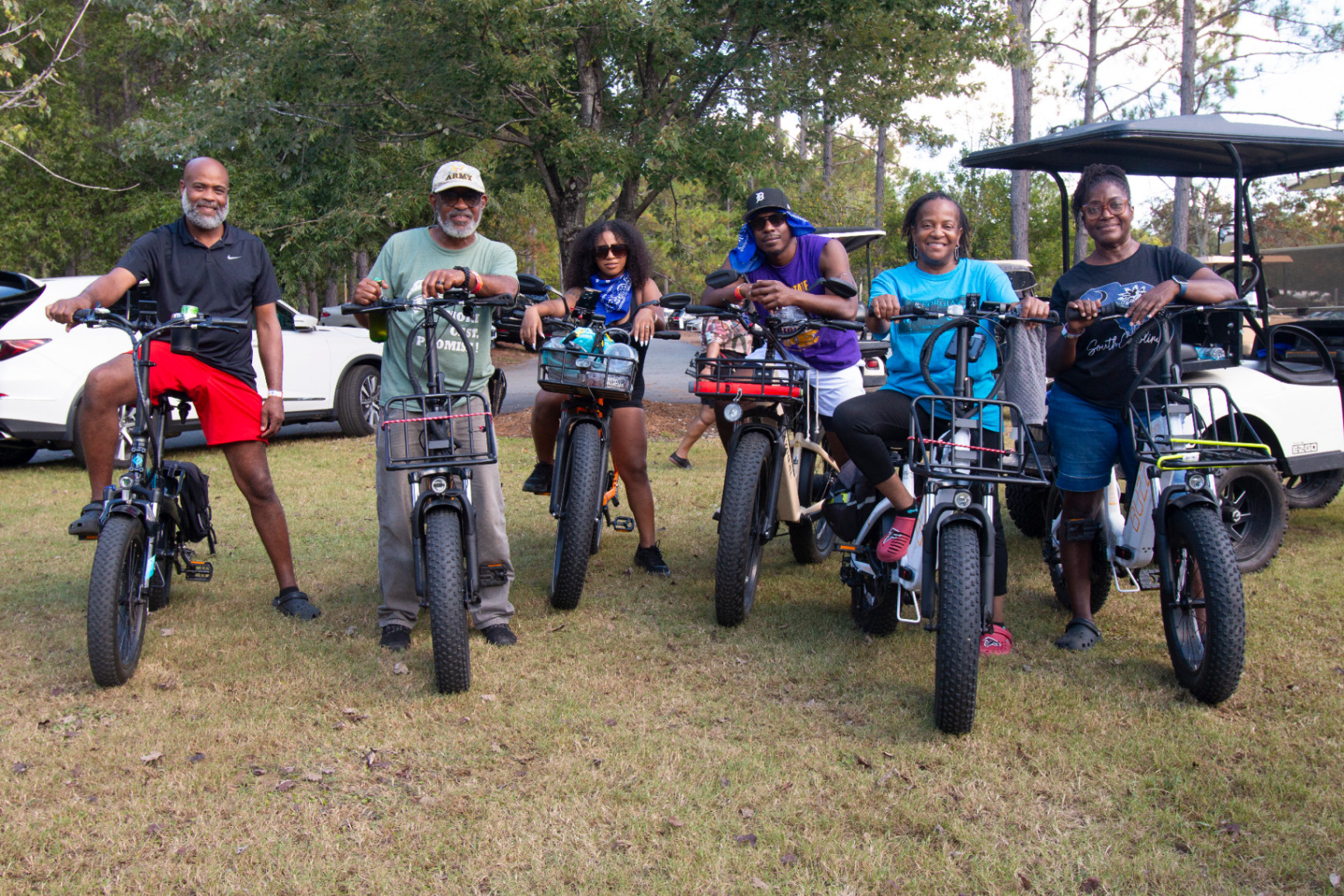 Six Melanated Campout attendees on electric bikes