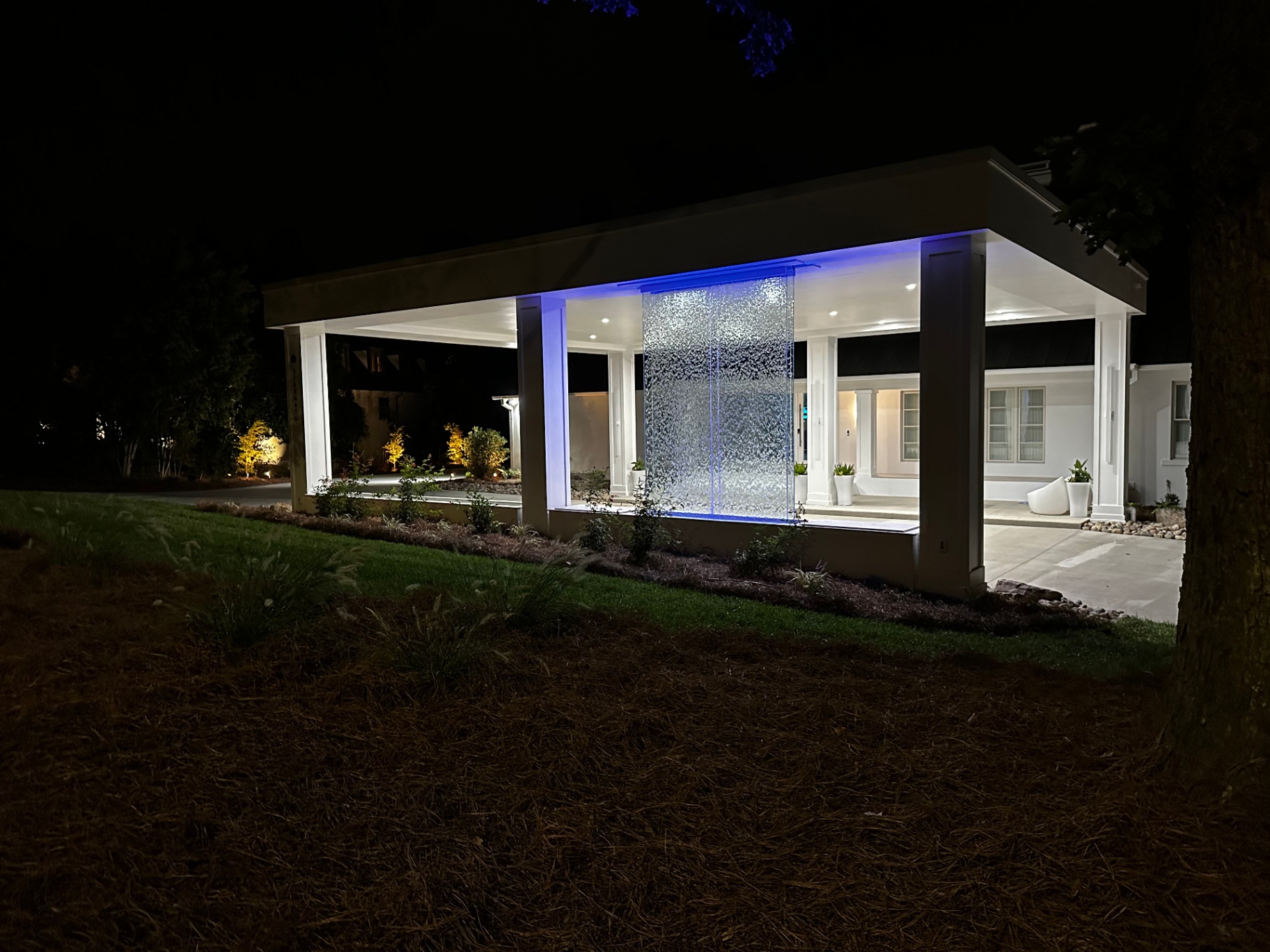 Modern Residential Entrance with Waterwall Feature