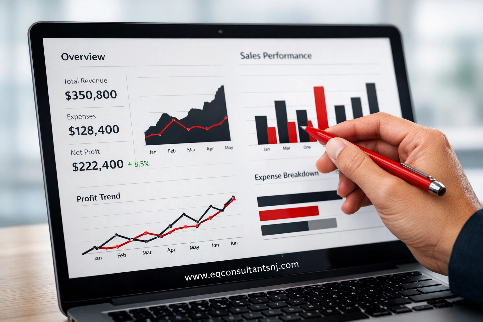 A self-employed bookkeeper reviewing financial charts on a laptop to ensure data accuracy and oversight.