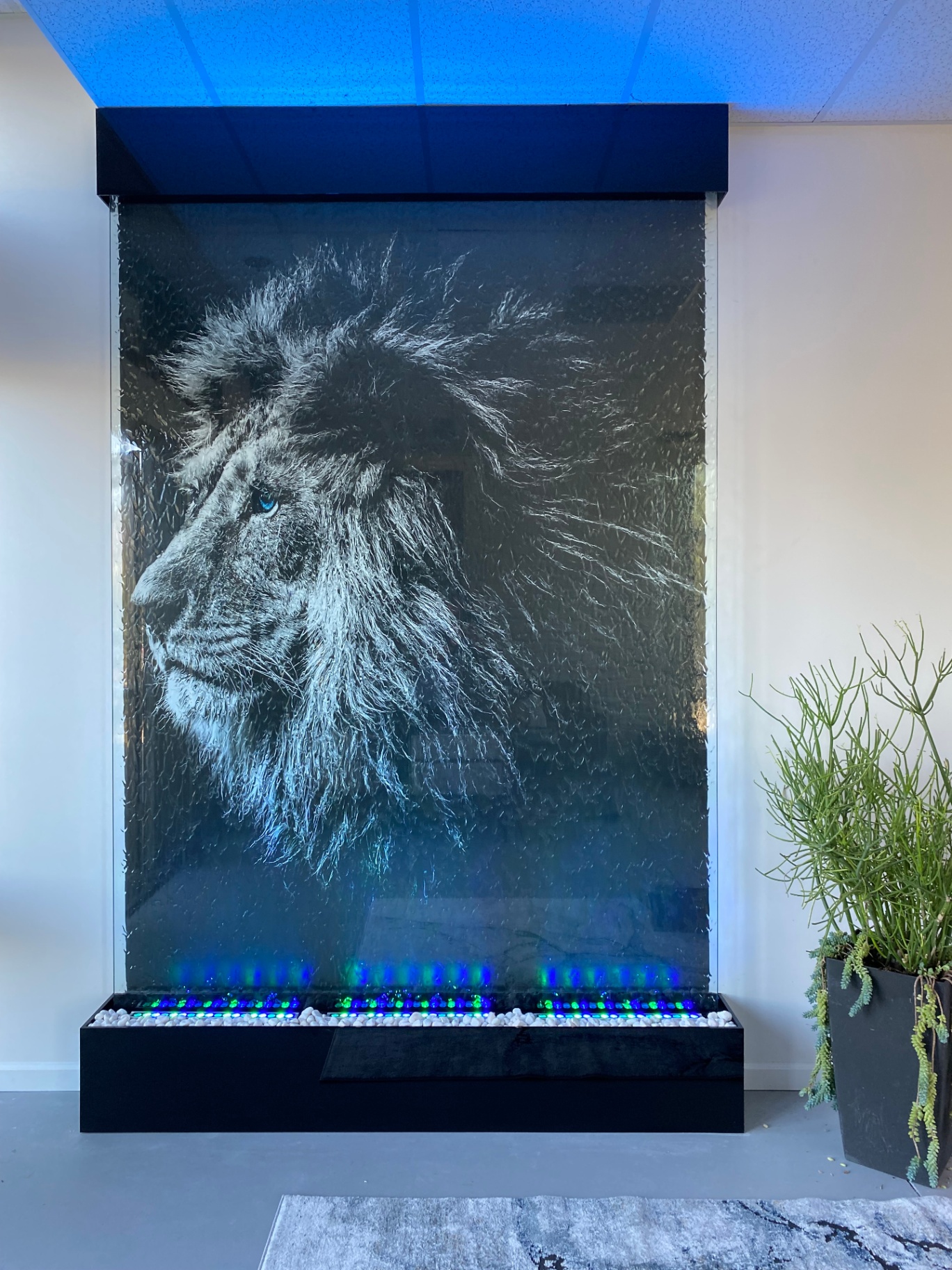 Large Indoor Waterwall with Custom Lion Graphic