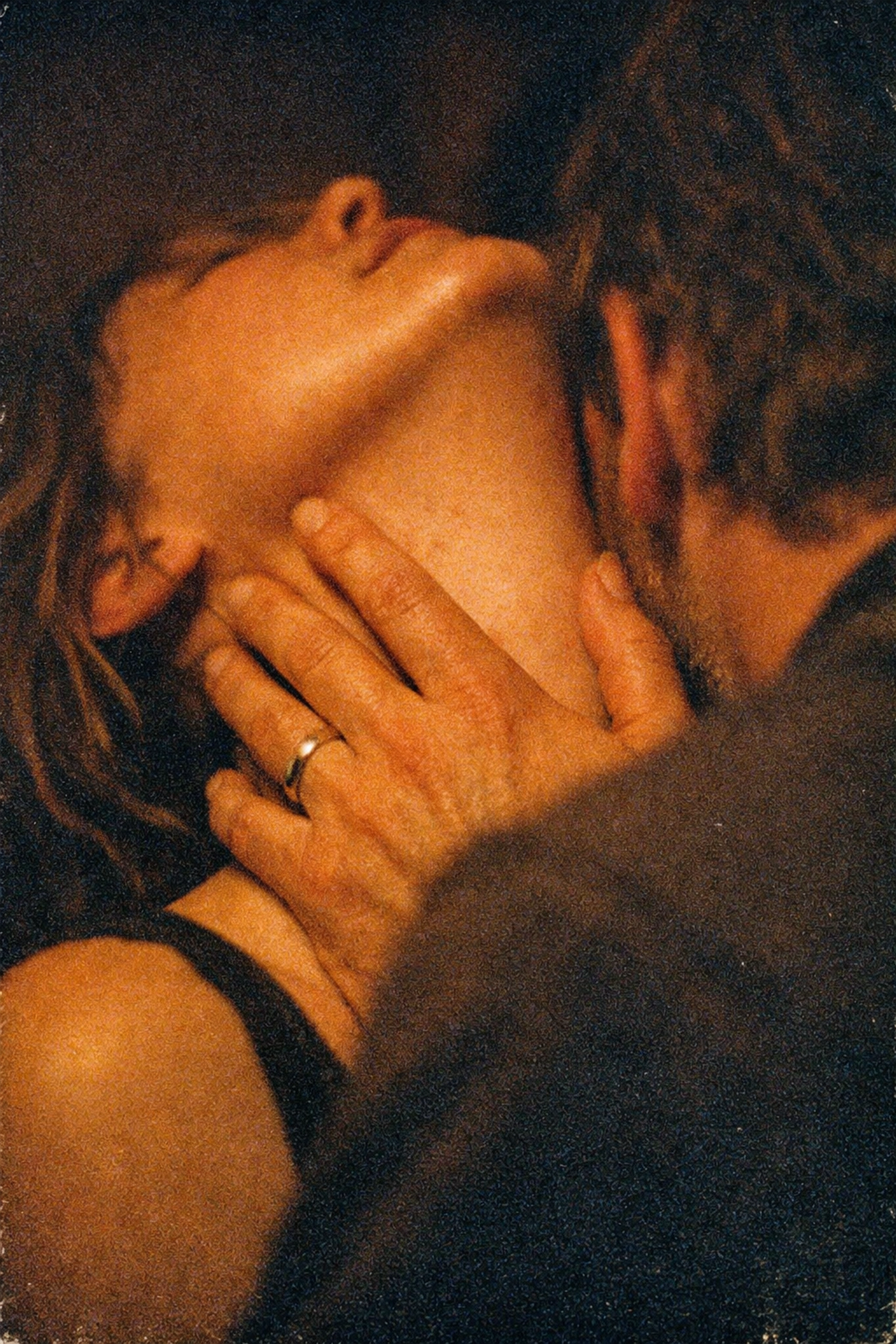 An intimate moment of surrender and trust in BDSM, highlighting the emotional depth of a power exchange.