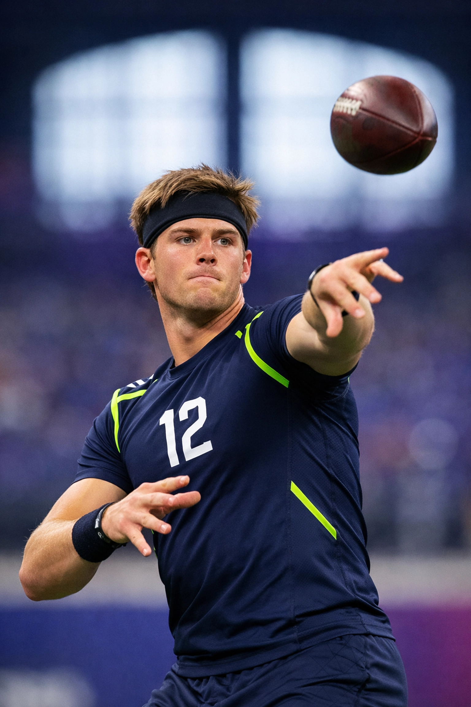 Alabama quarterback Ty Simpson participating in passing drills at the 2026 NFL Combine.