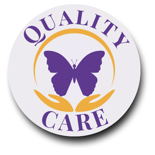 QUALITY CARE Logo A circular logo featuring a purple butterfly in the center, encircled by two golden hands and an arc.