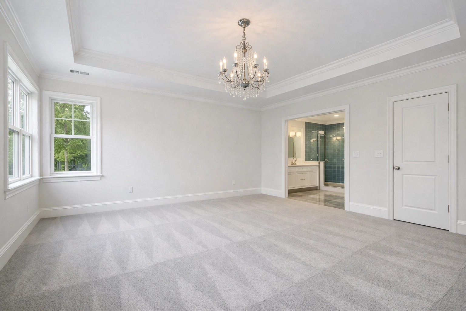 Luxury Shrewsbury bedroom with fresh vacuum lines after a professional move-in house cleaning.