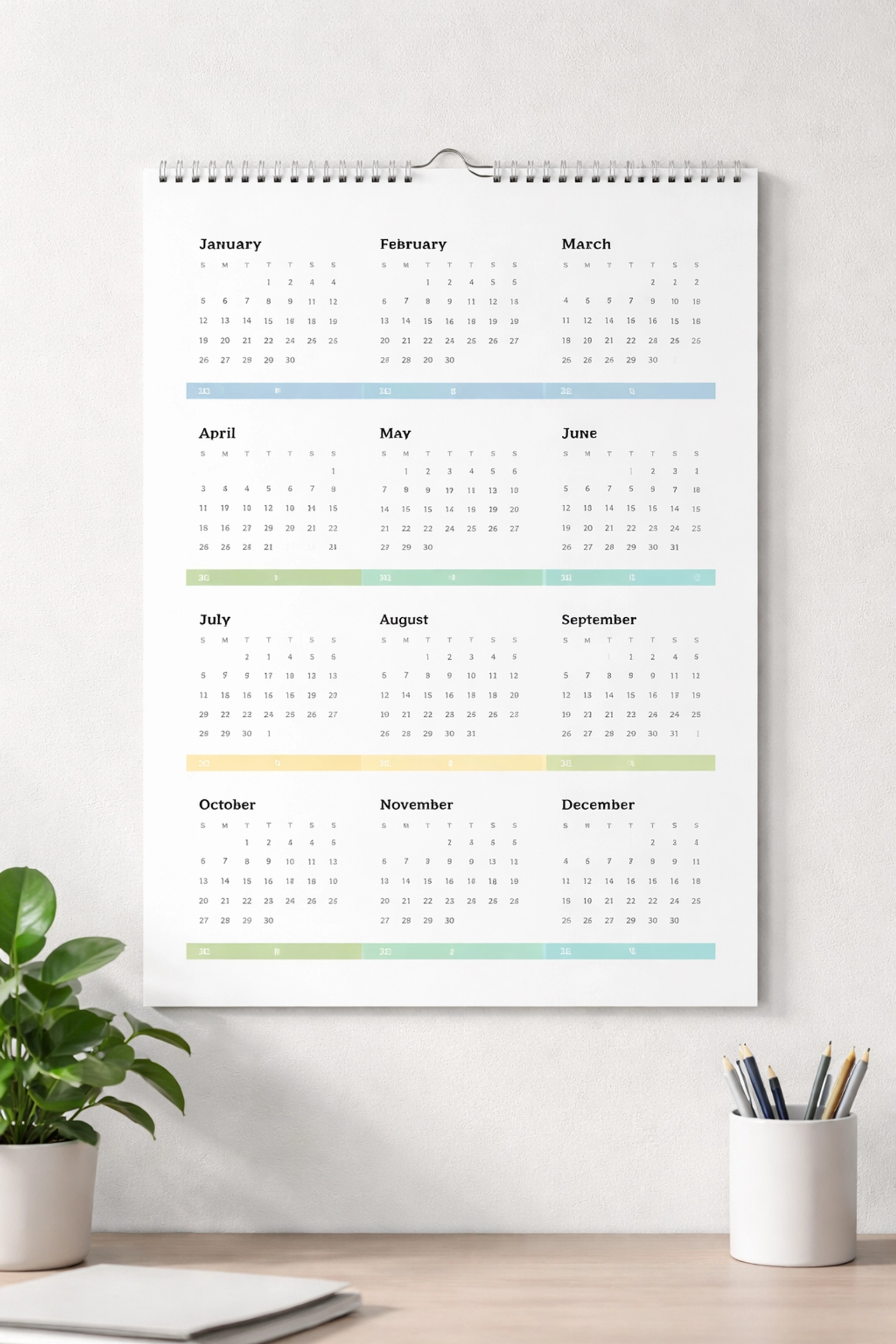 Modern wall calendar marked for quarterly milestones, highlighting year-round tax planning strategies