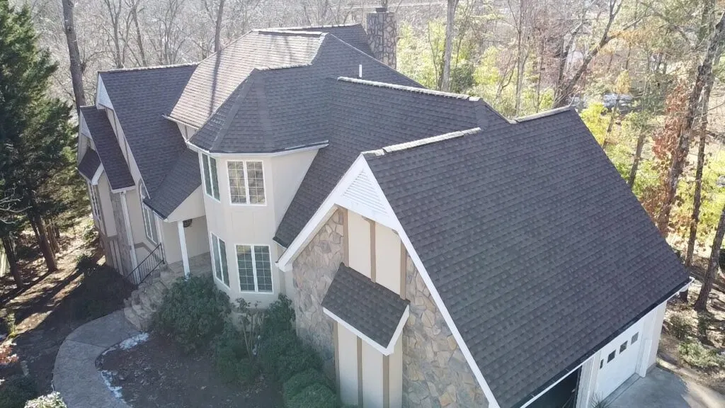 Impeccably finished multi-gable asphalt shingle roof on a large residential home