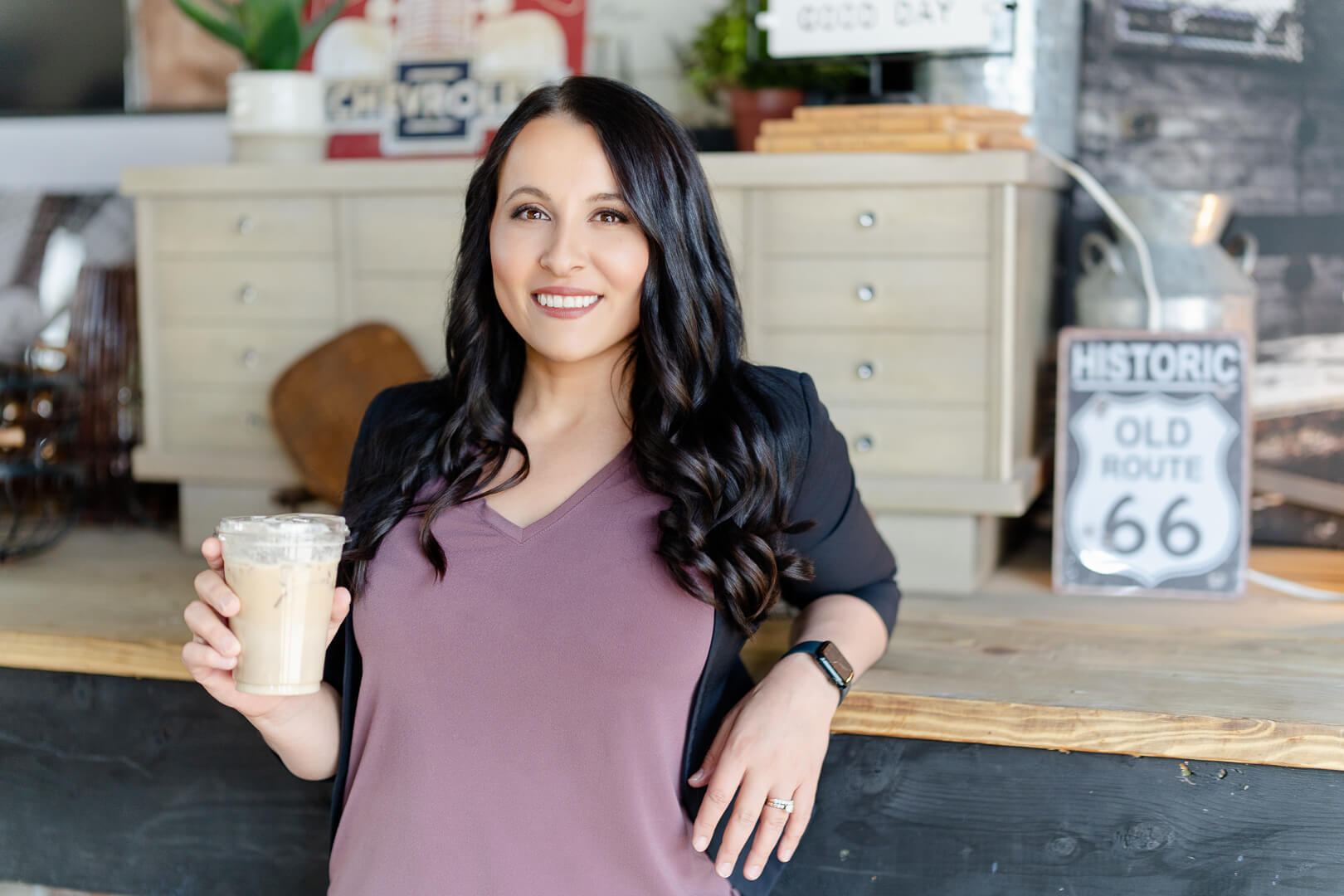 Confident woman at rustic counter