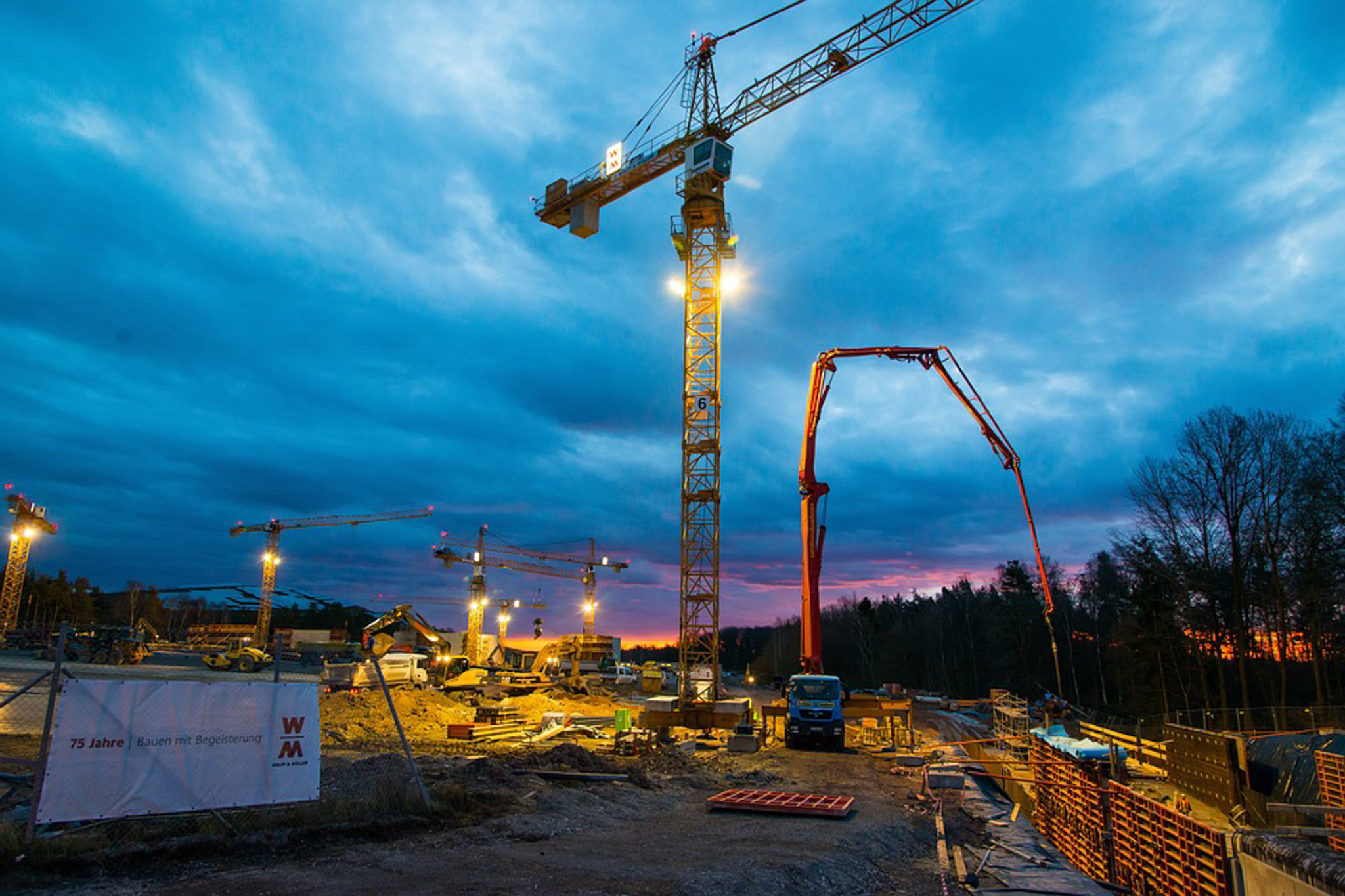 Active construction site at dusk