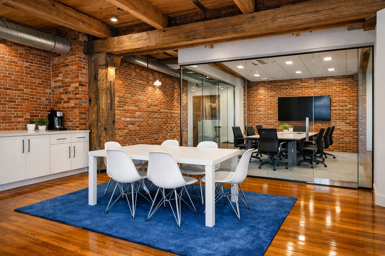 Renovated brick-and-beam Malden office with clean wood floors and customized janitorial services.