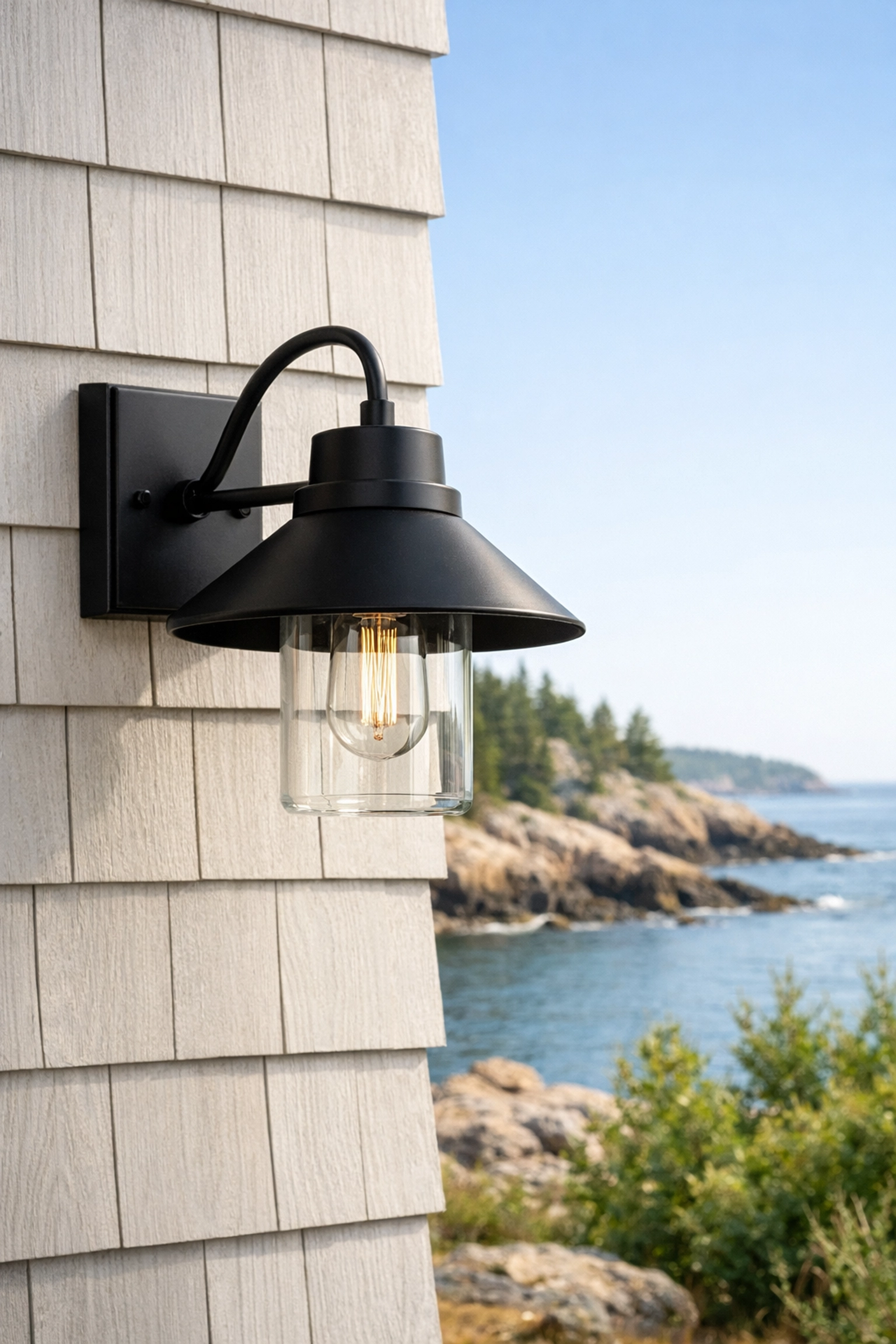 Weather-resistant outdoor lighting installed on a coastal Rockland home to prevent salt air corrosion.