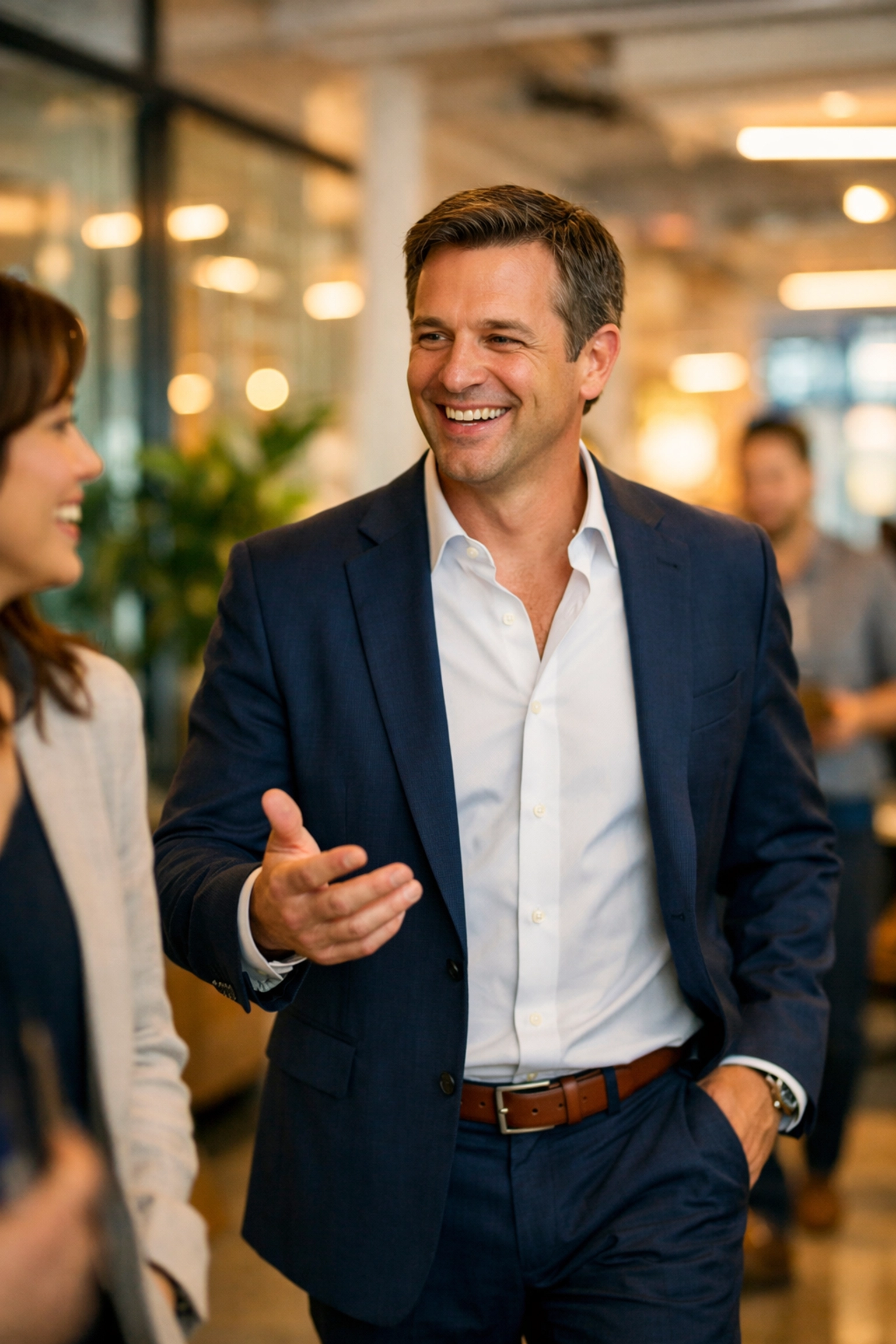 Confident executive in a modern office, representing effective retention and talent management strategies.