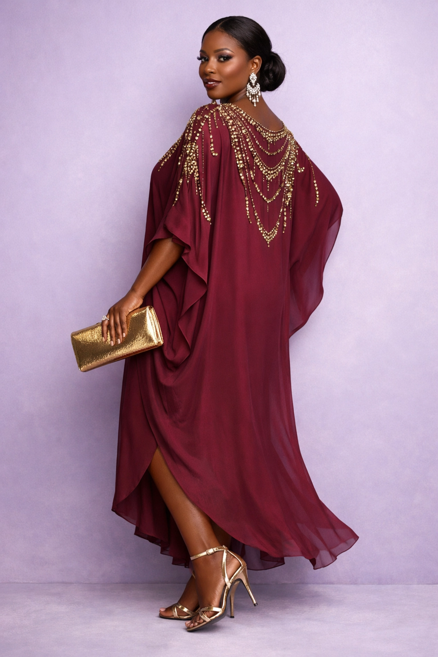 Burgundy embellished bubu dress styled for gala with statement accessories