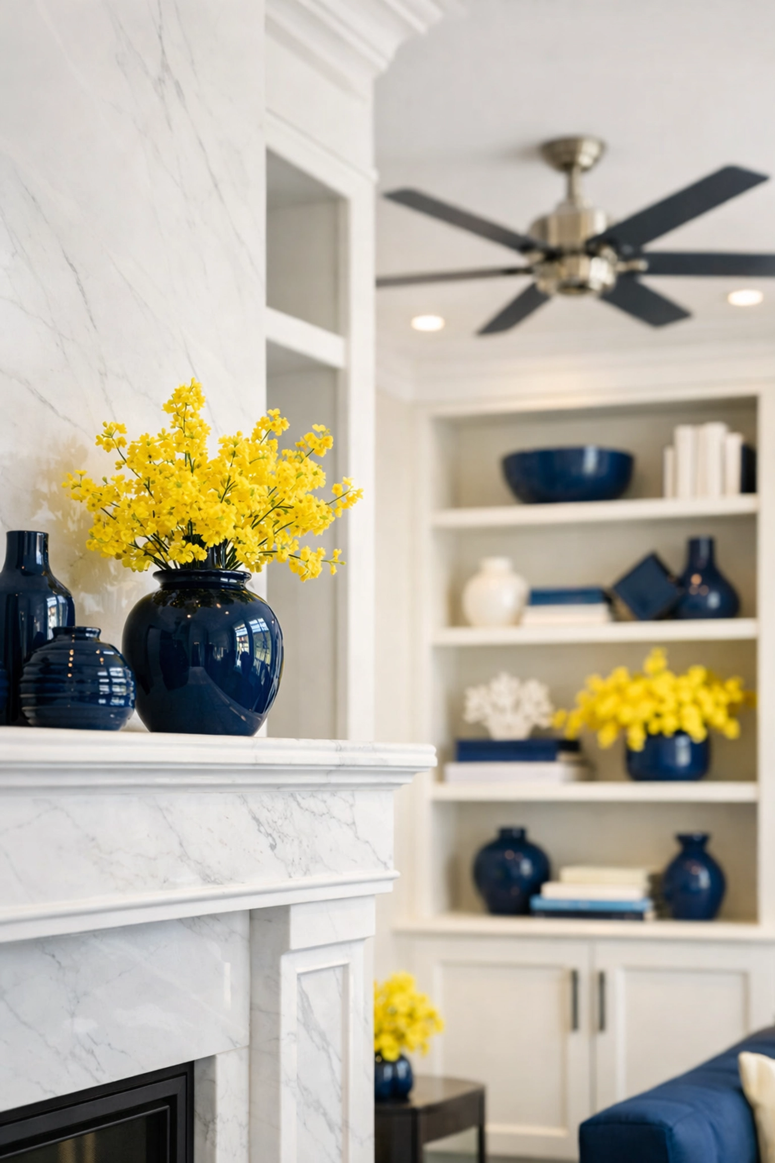Dust-free modern living room in Lowell with a white marble fireplace after a thorough deep cleaning Lowell.