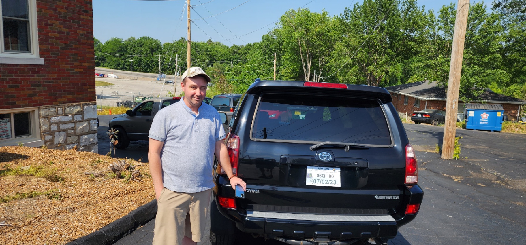 Customer with Black Toyota 4Runner - Grateful Motors