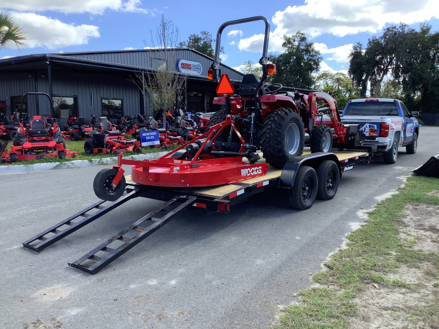 TYM tractor with Woods rotary cutter at Ocala Tractor LLC