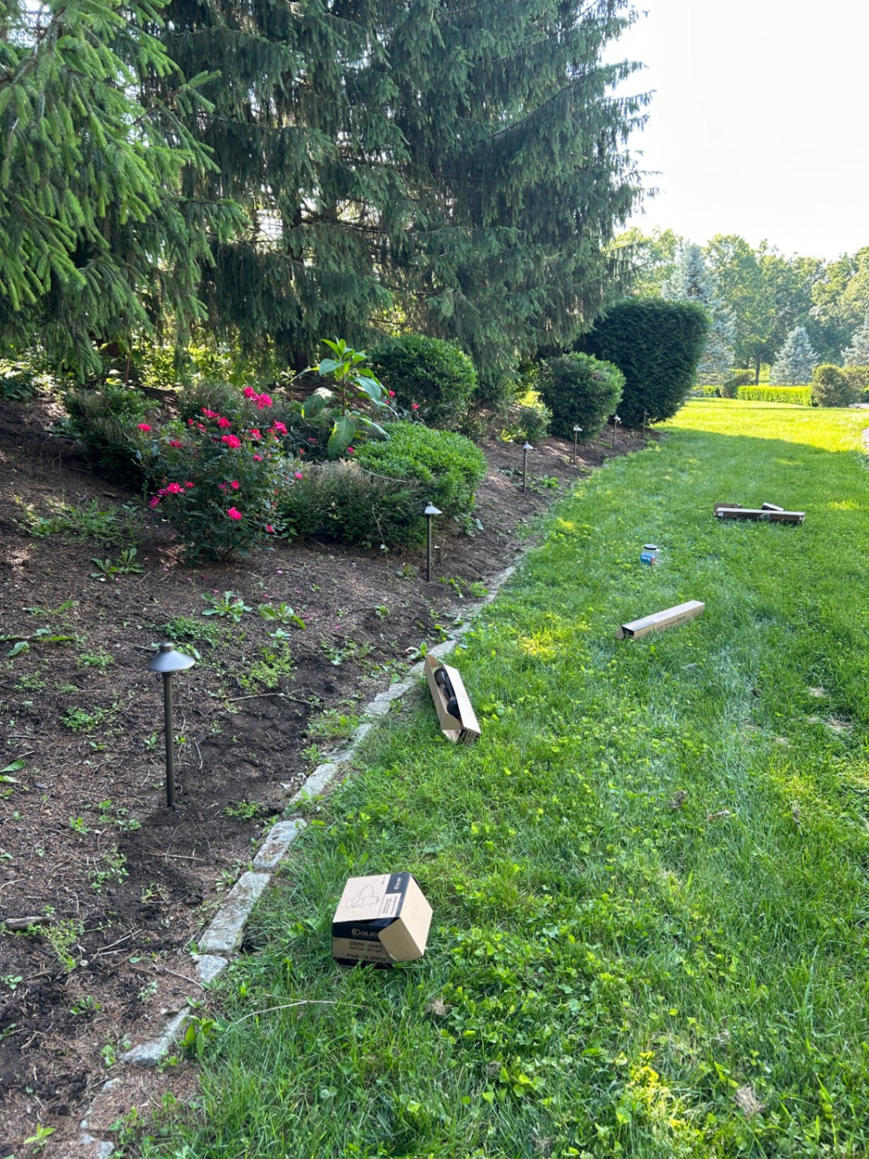 Low-voltage path lights installation in garden