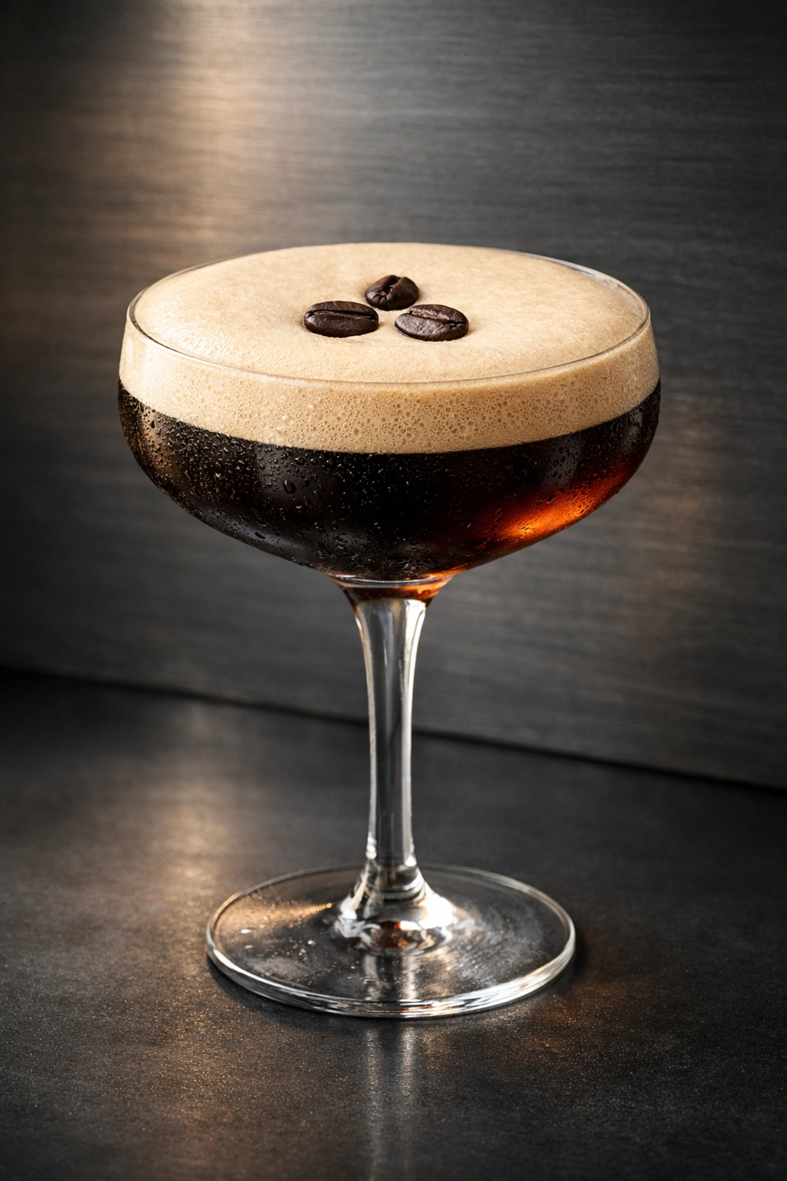 An elegant espresso martini garnished with coffee beans, highlighting our high-proof craft coffee liqueur.