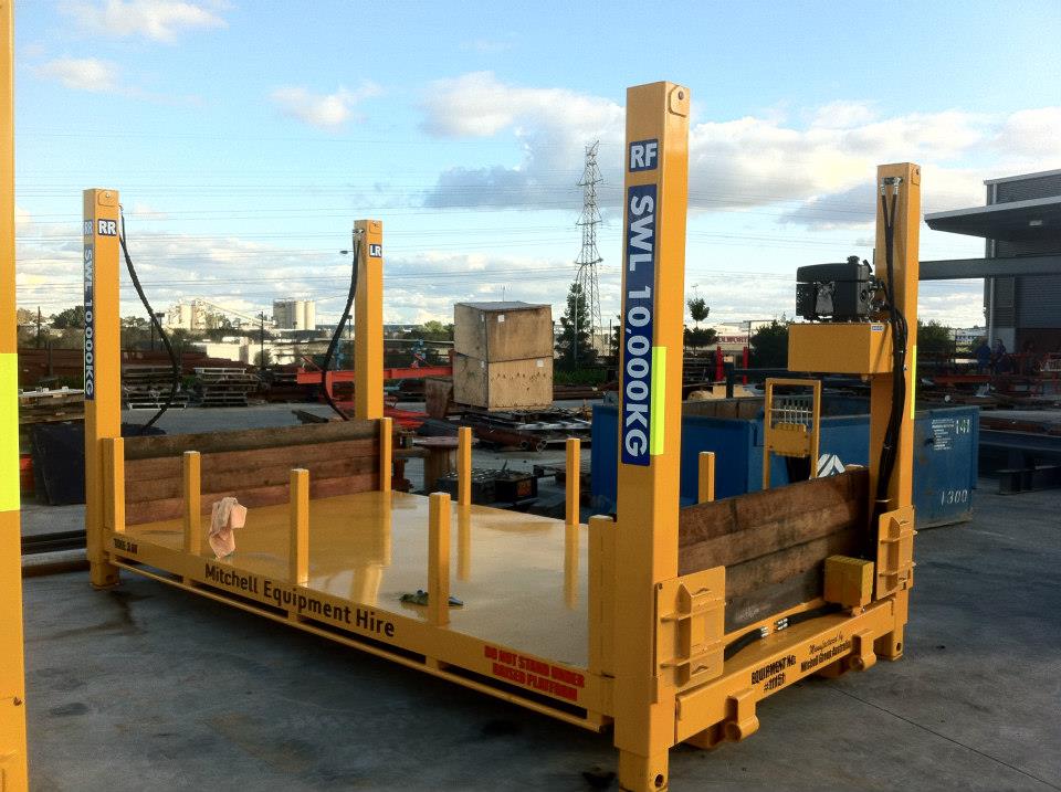 Industrial warehouse in Queensland with a yellow forklift displaying machinery identification stickers