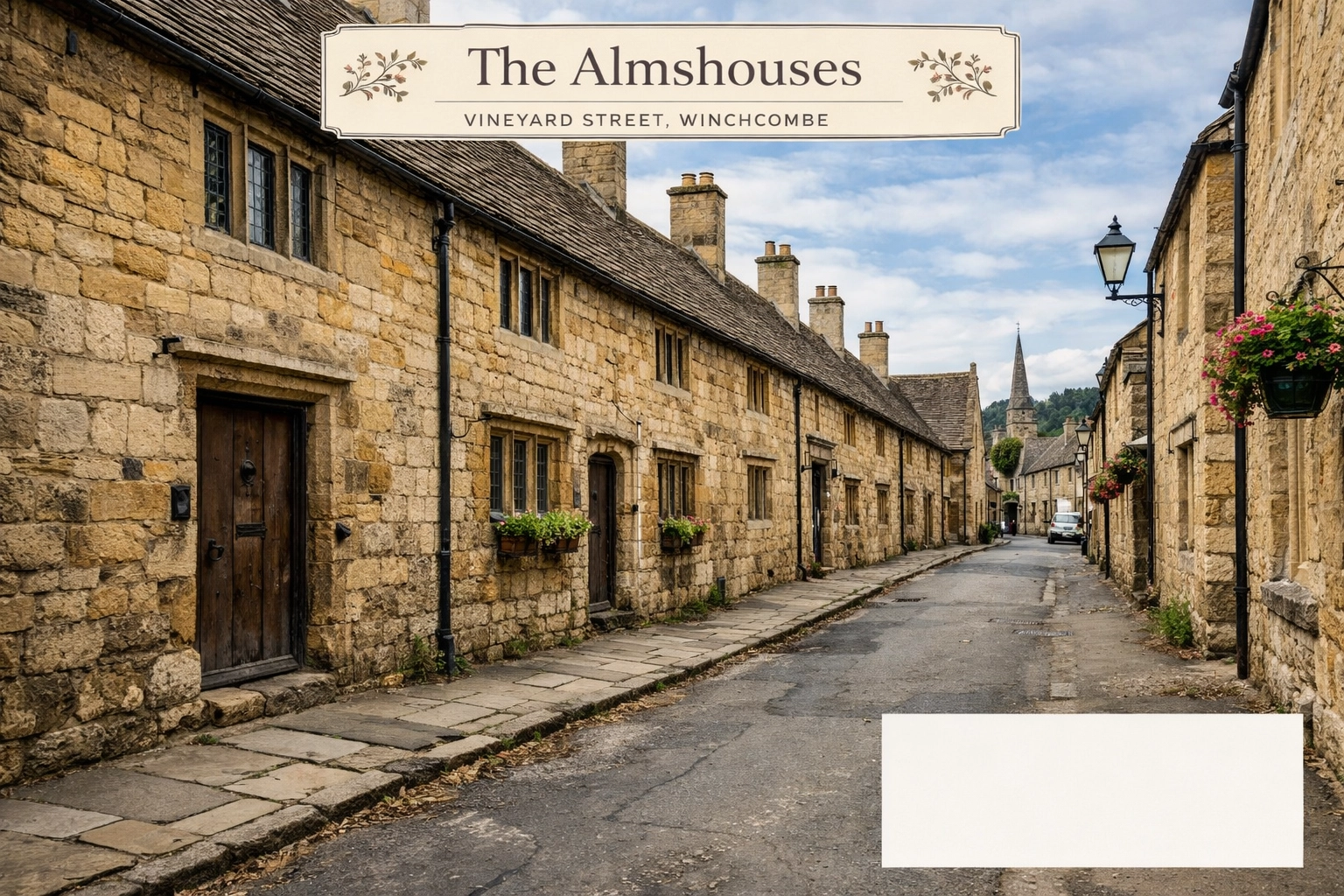 Iconic Cotswold stone Almshouses on Vineyard Street in the town of Winchcombe.