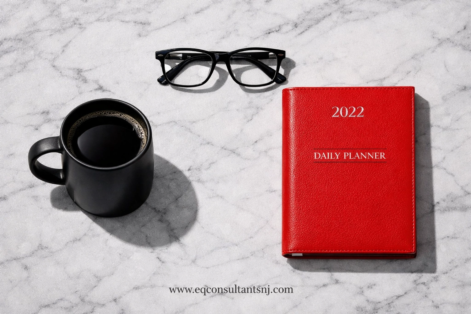 Professional workspace flat lay for NJ consultants featuring a planner and tools for financial organization.