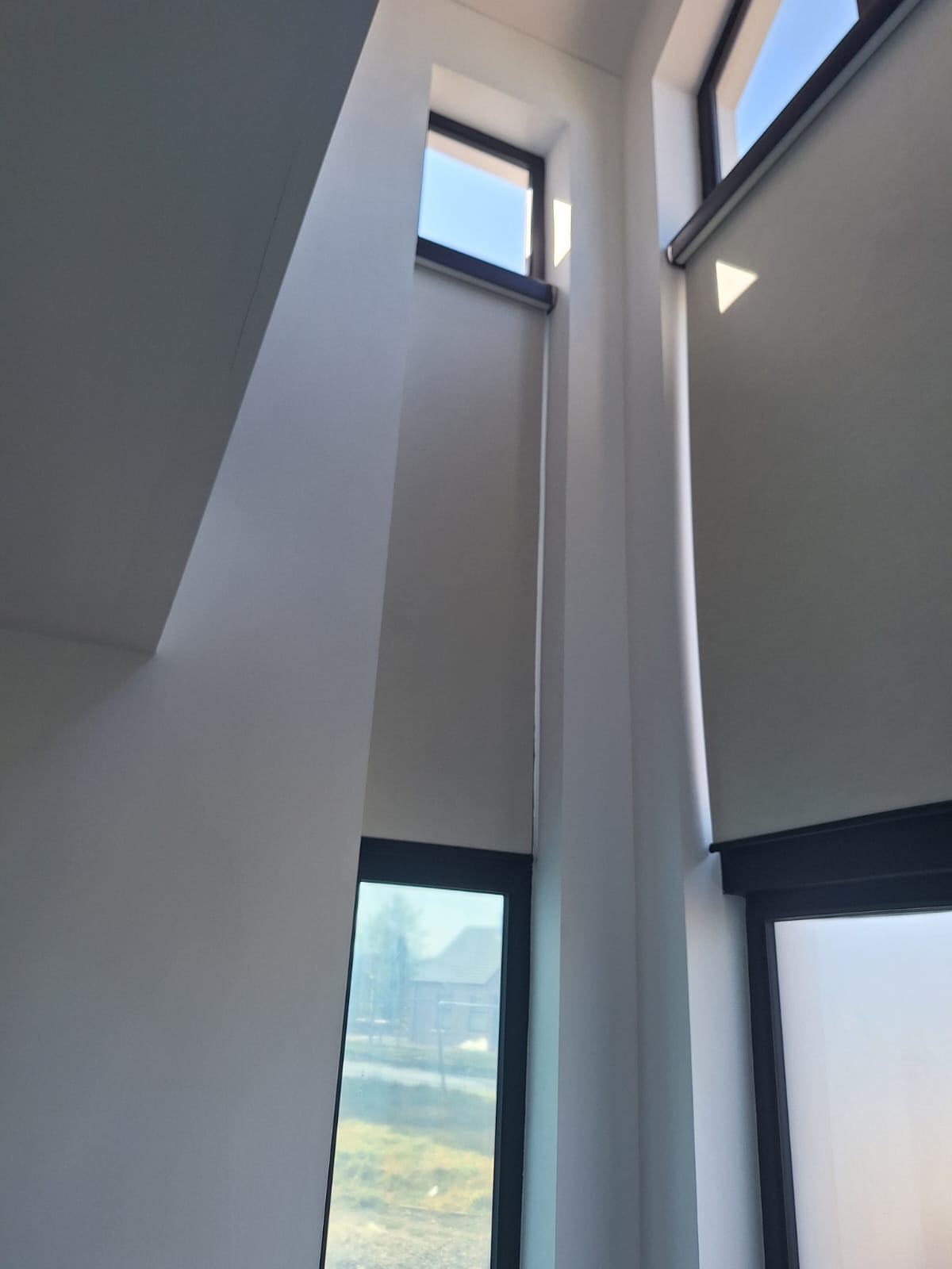 Bespoke light-filtering window solutions demonstrating expertise in unique architectural spaces