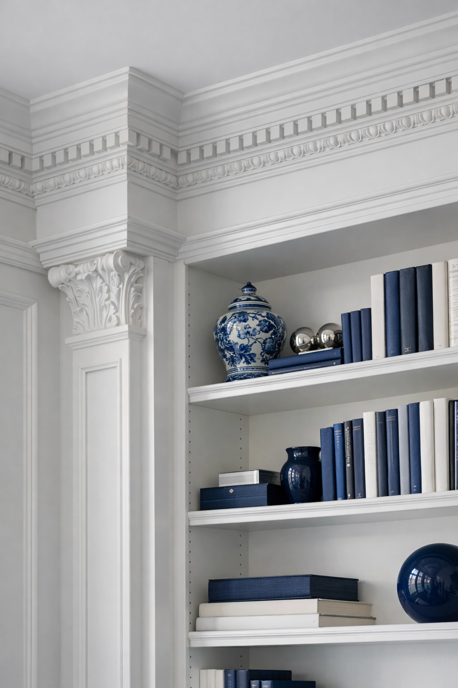 Spotless bookshelf and crown molding in a Wellesley home after a detailed house cleaning mission.