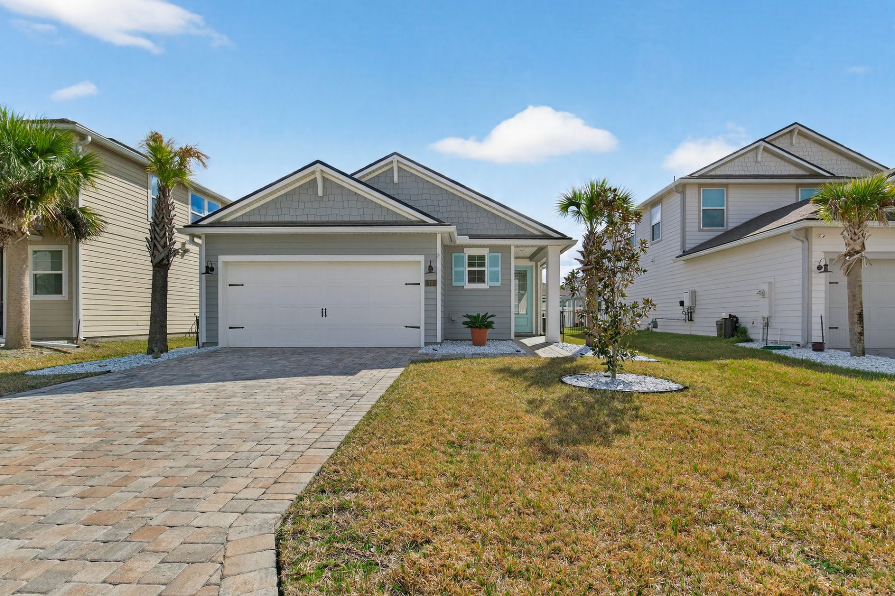 Before grass enhancement at 78 Greenway Lane showing brownish lawn