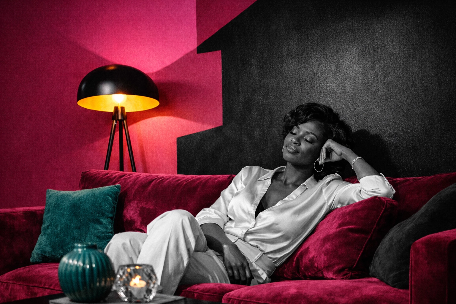 A Black woman enjoying peace of mind in her Gwinnett home thanks to safe, reliable electrical lighting.