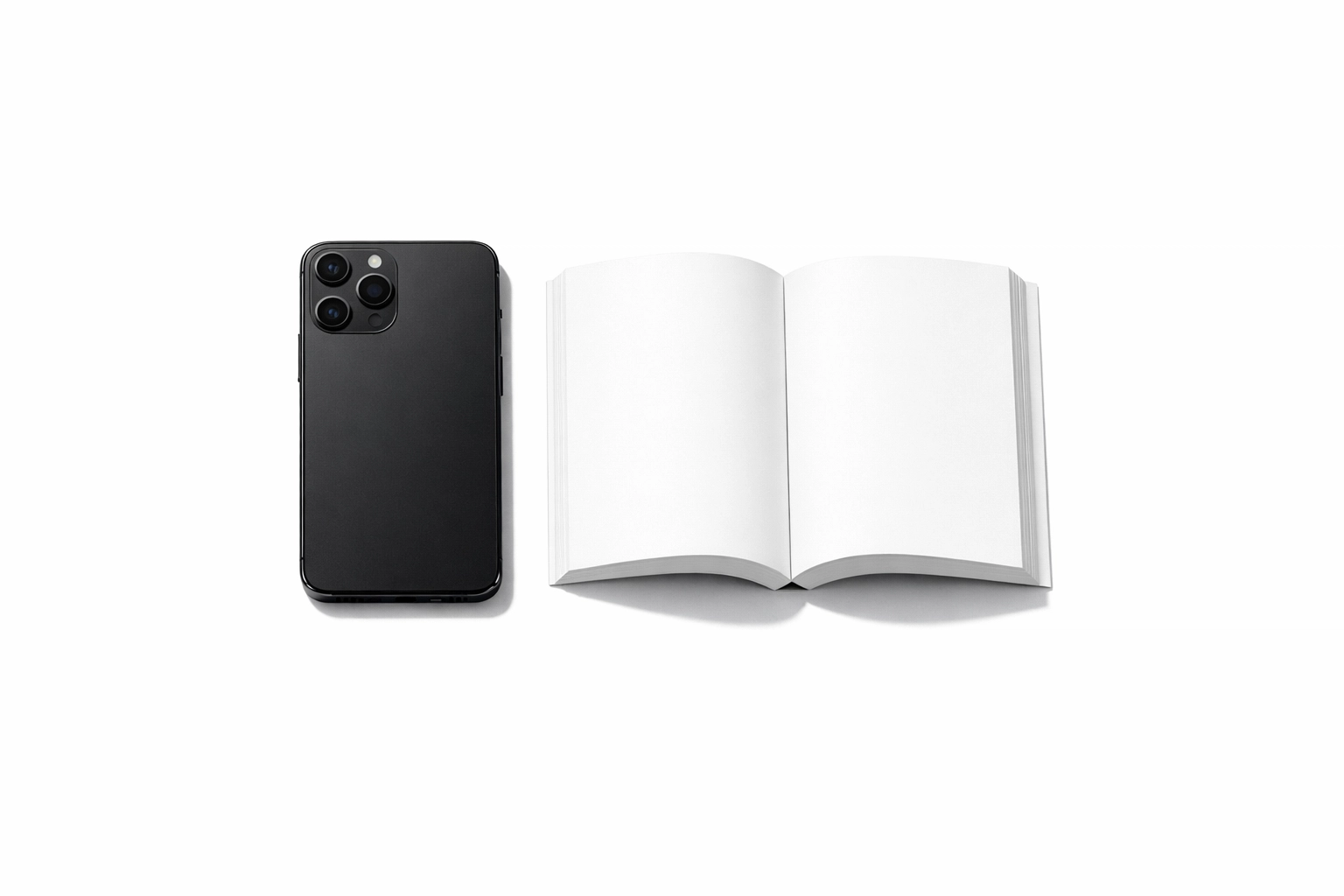 Smartphone face-down next to an open book, showing how to rebuild reading focus and overcome digital distraction.