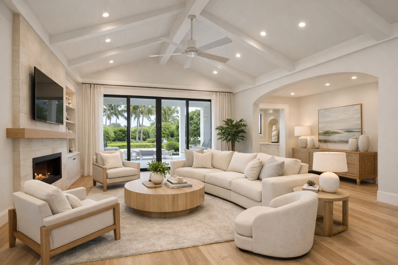 A completed Orlando home renovation featuring a modern-coastal living room and light oak floors.