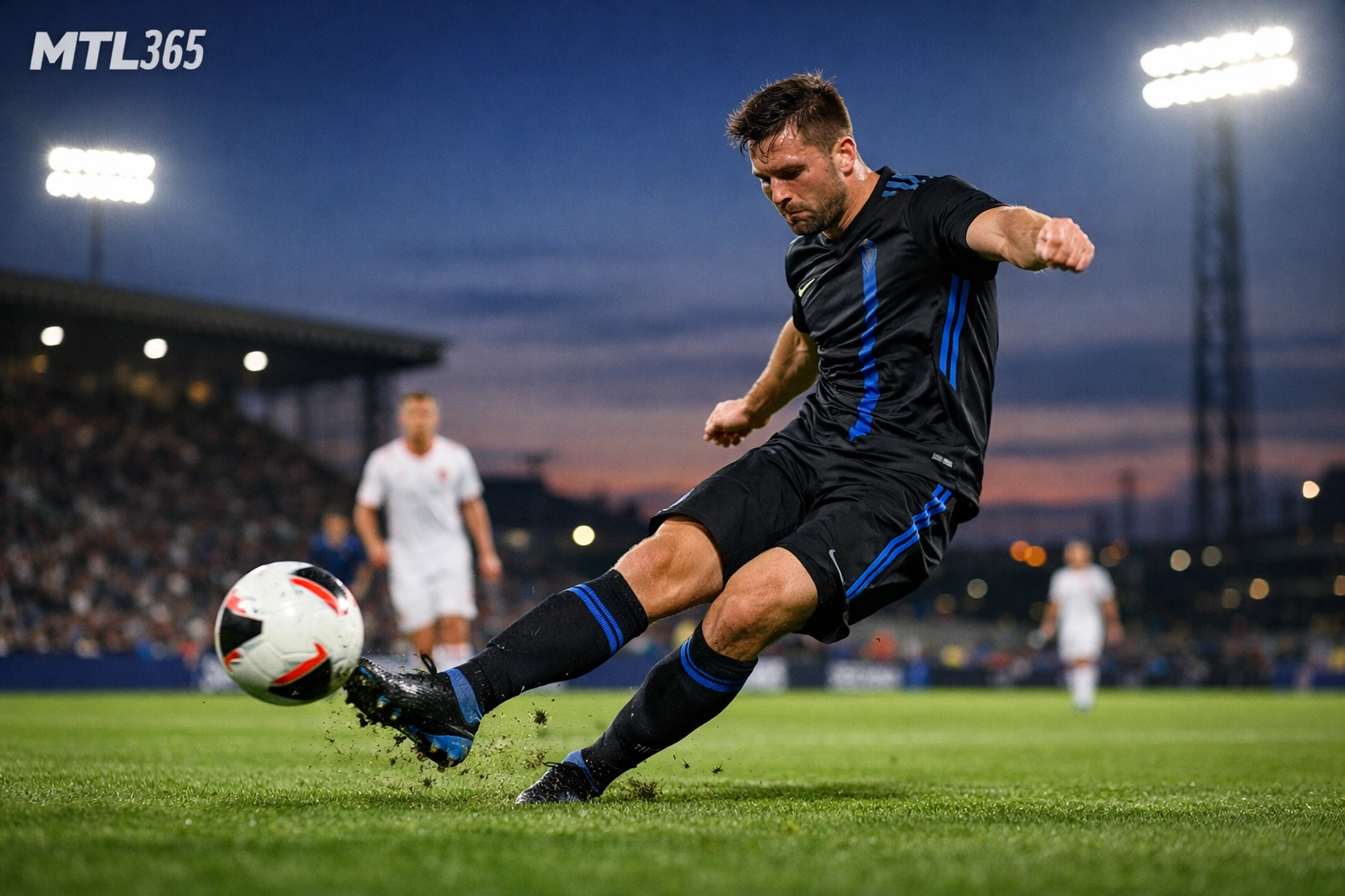 CF Montréal soccer player taking a strike during a night match at Stade Saputo.