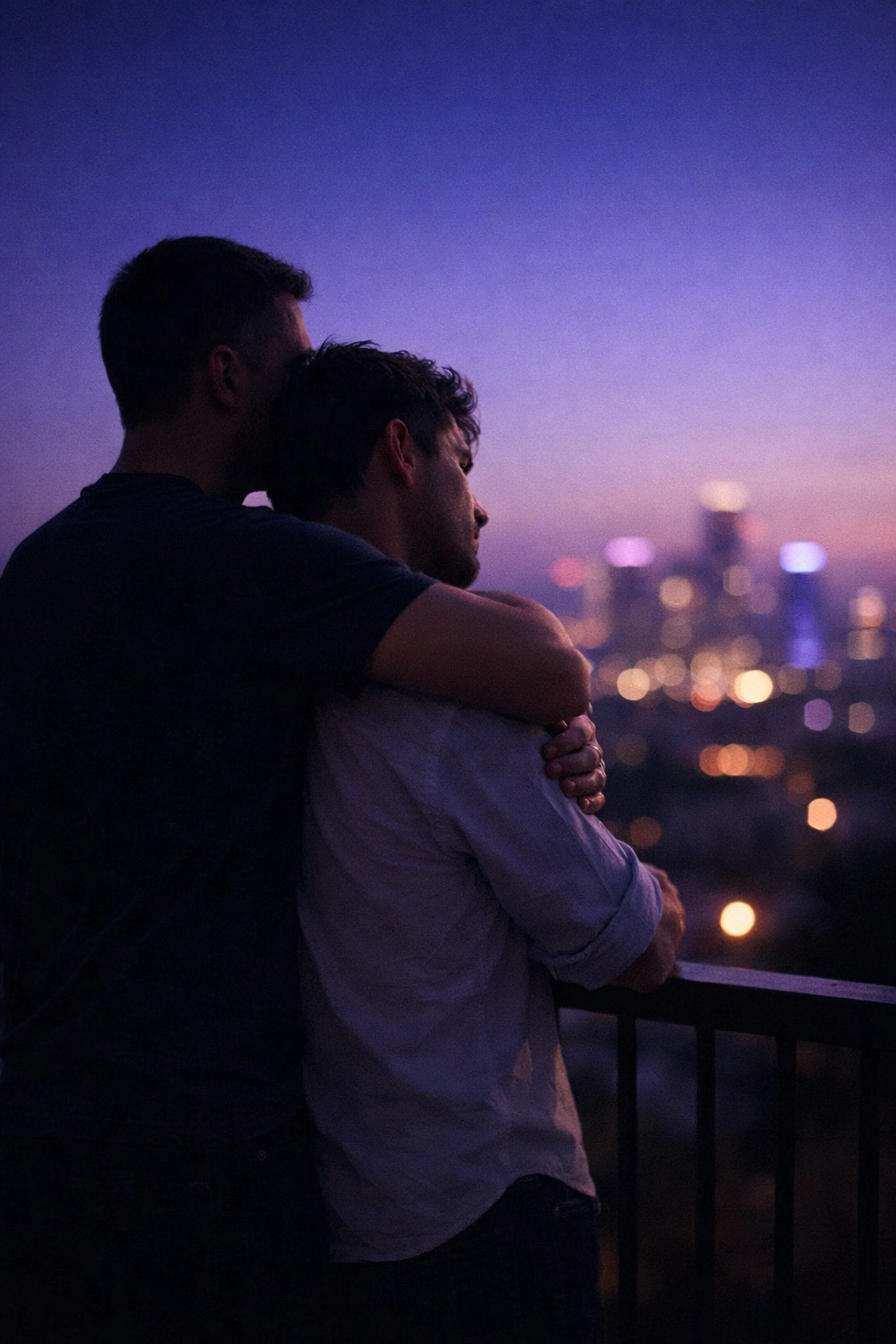 Gay couple in a protective embrace at twilight, symbolizing a strong emotional bond and shared future.