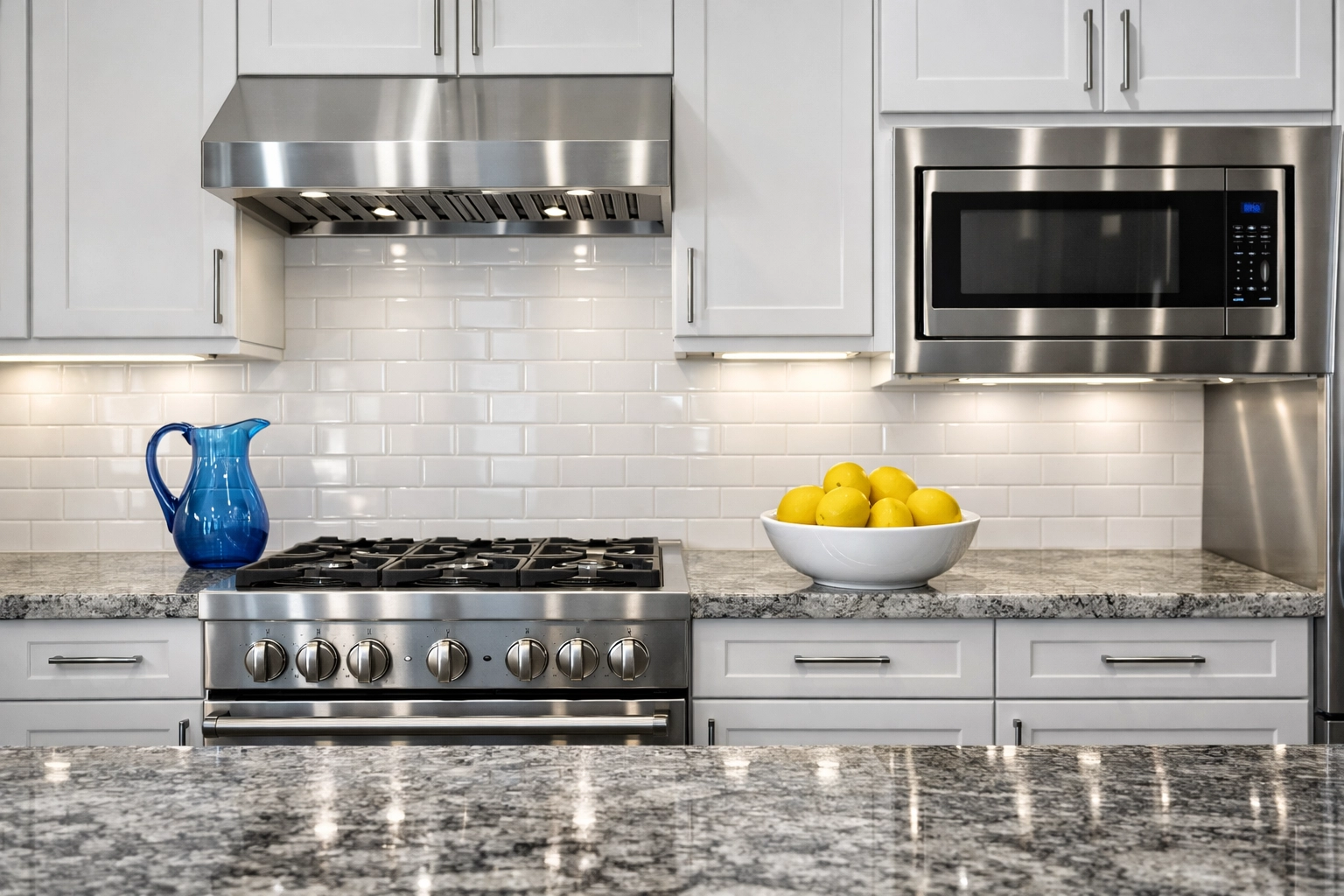 Sparkling clean kitchen with polished surfaces after a deep house cleaning Lowell MA session.