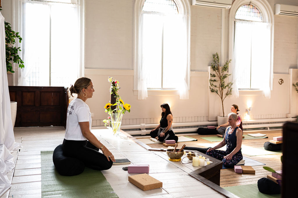 Small Group Yoga Class in Bright Studio