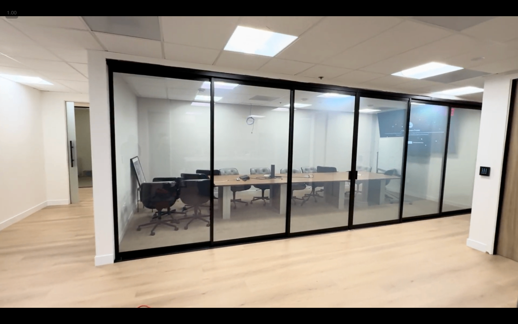 Glass-walled conference room with switchable Smart View film