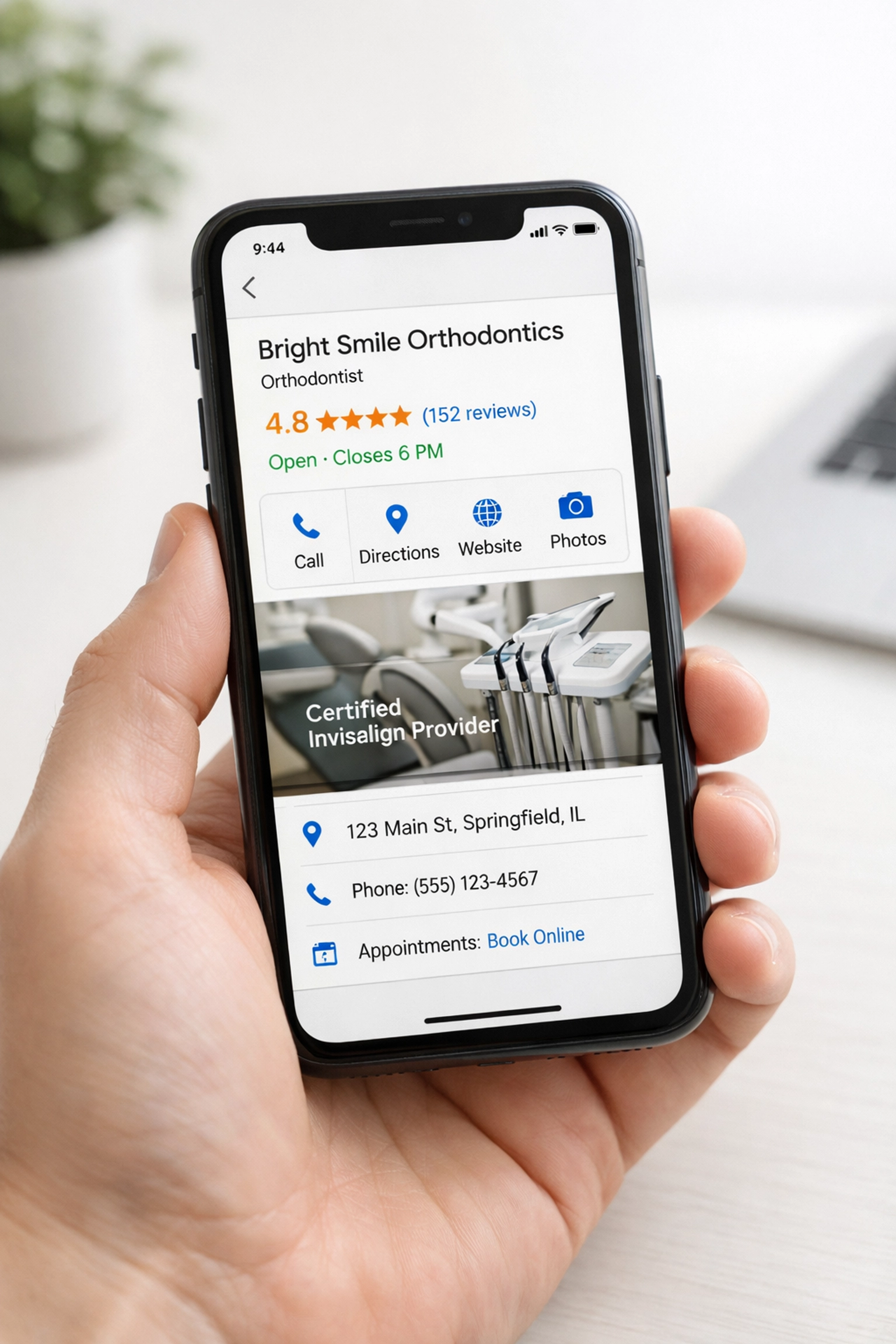 Smartphone displaying Google Business Profile for orthodontist with star ratings and reviews